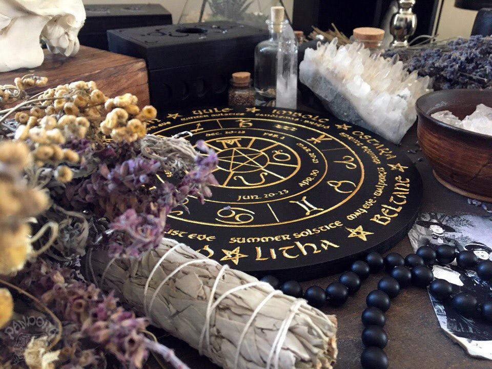 Wooden Wheel of the Year - calendar of pagan festivals and seasonal sabbaths: Yule, Imbolc, Ostara, Beltane, Litha, Lammas, Mabon, Samhain.