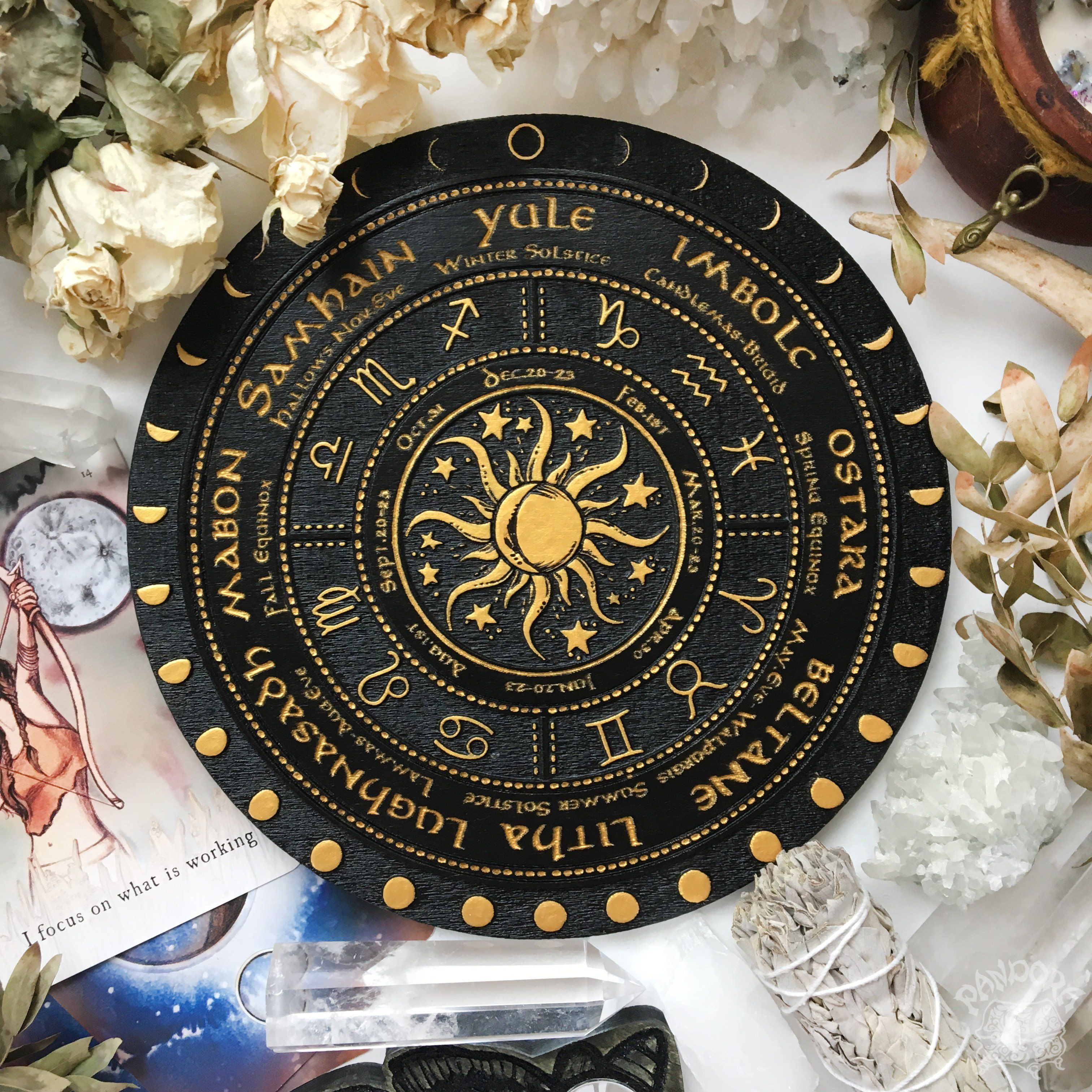 Wooden Wheel of the Year - calendar of pagan festivals and seasonal sabbaths: Yule, Imbolc, Ostara, Beltane, Litha, Lammas, Mabon, Samhain.
