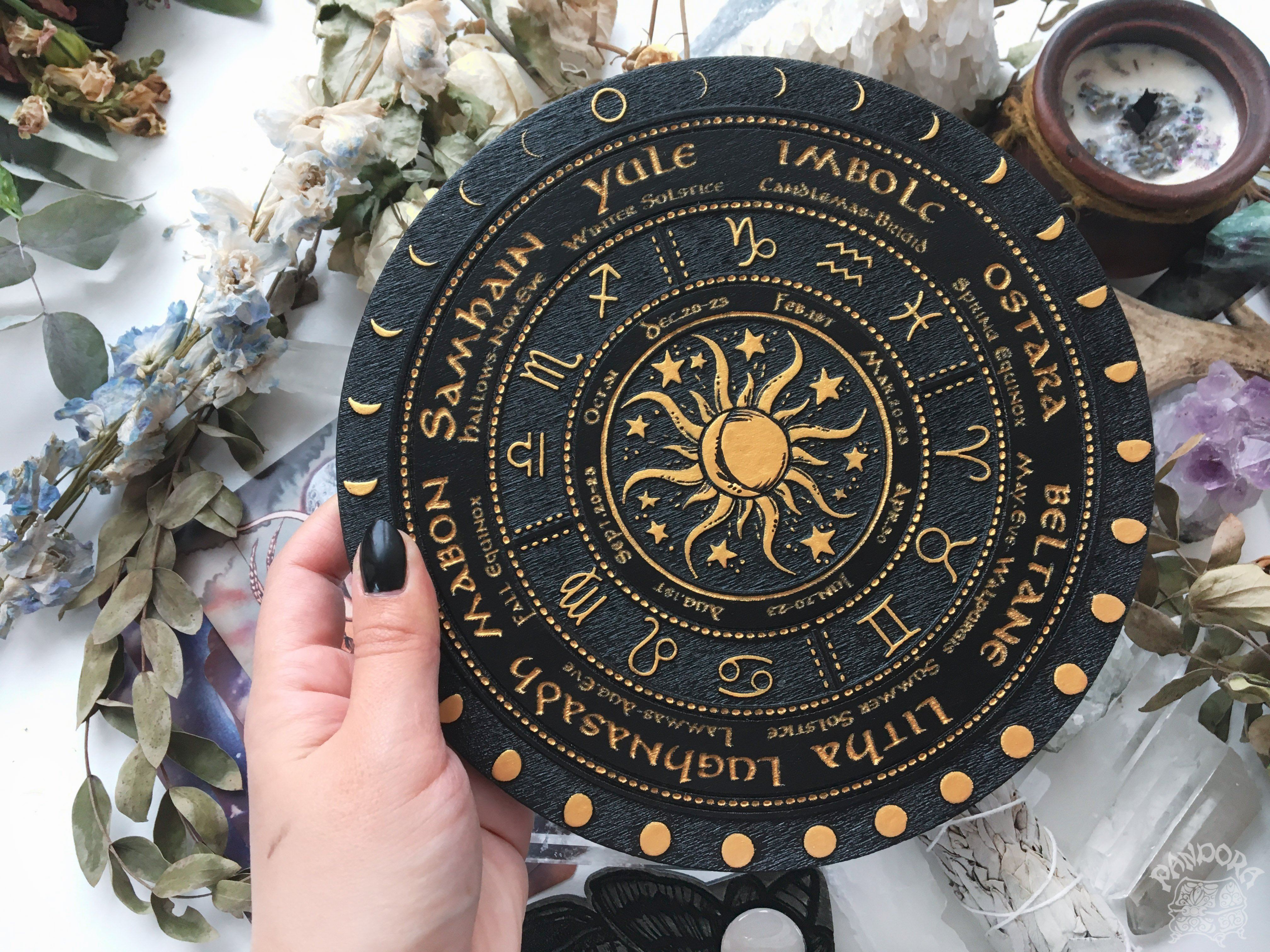 Wooden Wheel of the Year - calendar of pagan festivals and seasonal sabbaths: Yule, Imbolc, Ostara, Beltane, Litha, Lammas, Mabon, Samhain.