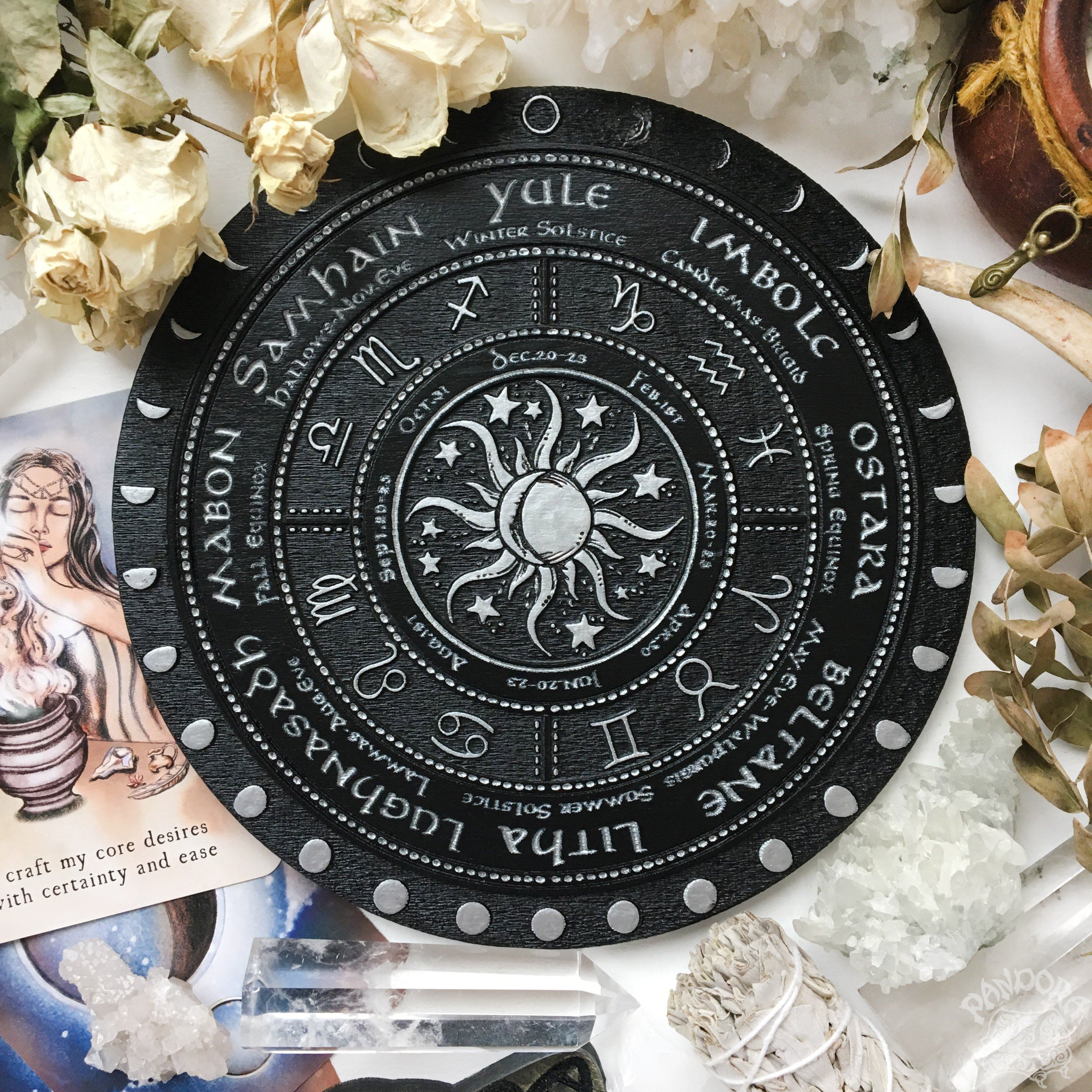 Wooden Wheel of the Year - calendar of pagan festivals and seasonal sabbaths: Yule, Imbolc, Ostara, Beltane, Litha, Lammas, Mabon, Samhain.