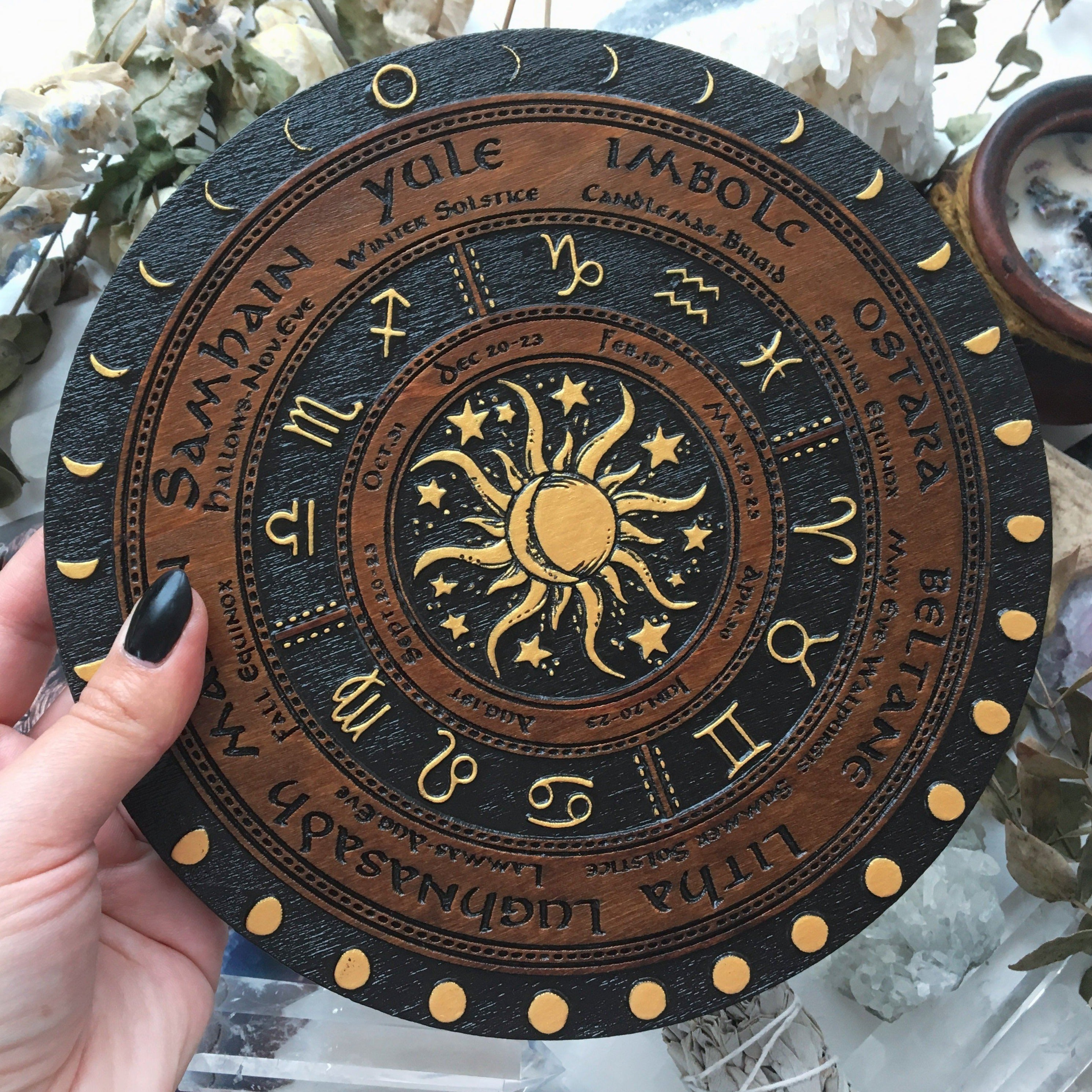 Wooden Wheel of the Year - calendar of pagan festivals and seasonal sabbaths: Yule, Imbolc, Ostara, Beltane, Litha, Lammas, Mabon, Samhain.