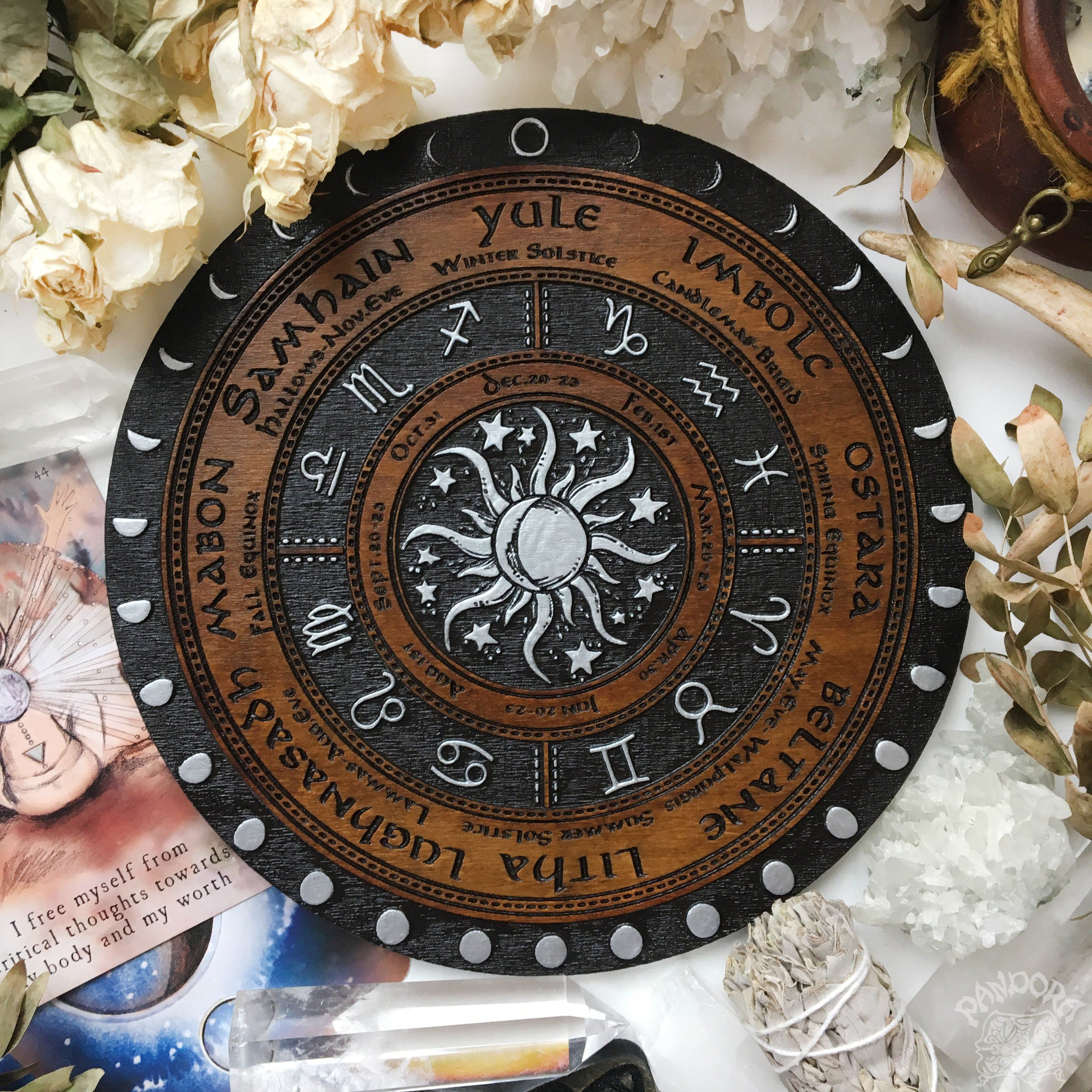 Wooden Wheel of the Year - calendar of pagan festivals and seasonal sabbaths: Yule, Imbolc, Ostara, Beltane, Litha, Lammas, Mabon, Samhain.