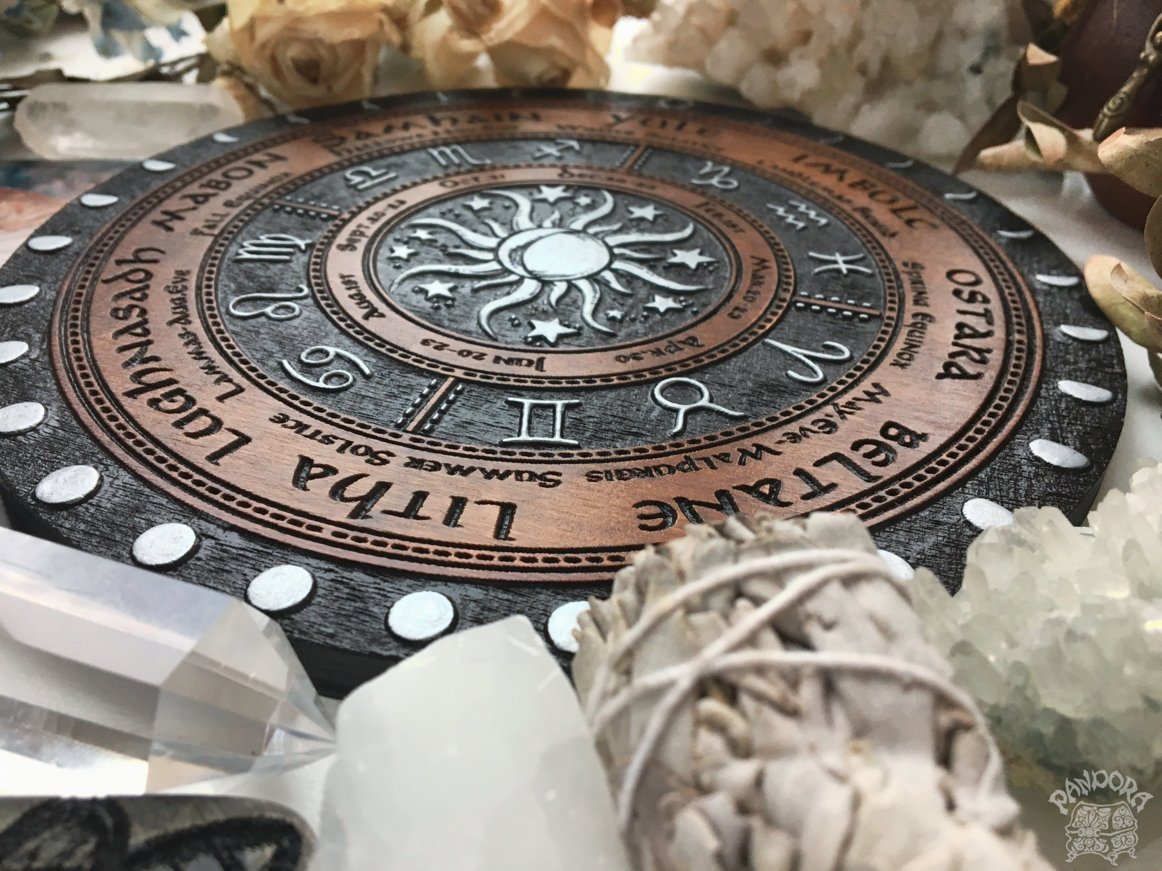 Wooden Wheel of the Year - calendar of pagan festivals and seasonal sabbaths: Yule, Imbolc, Ostara, Beltane, Litha, Lammas, Mabon, Samhain.