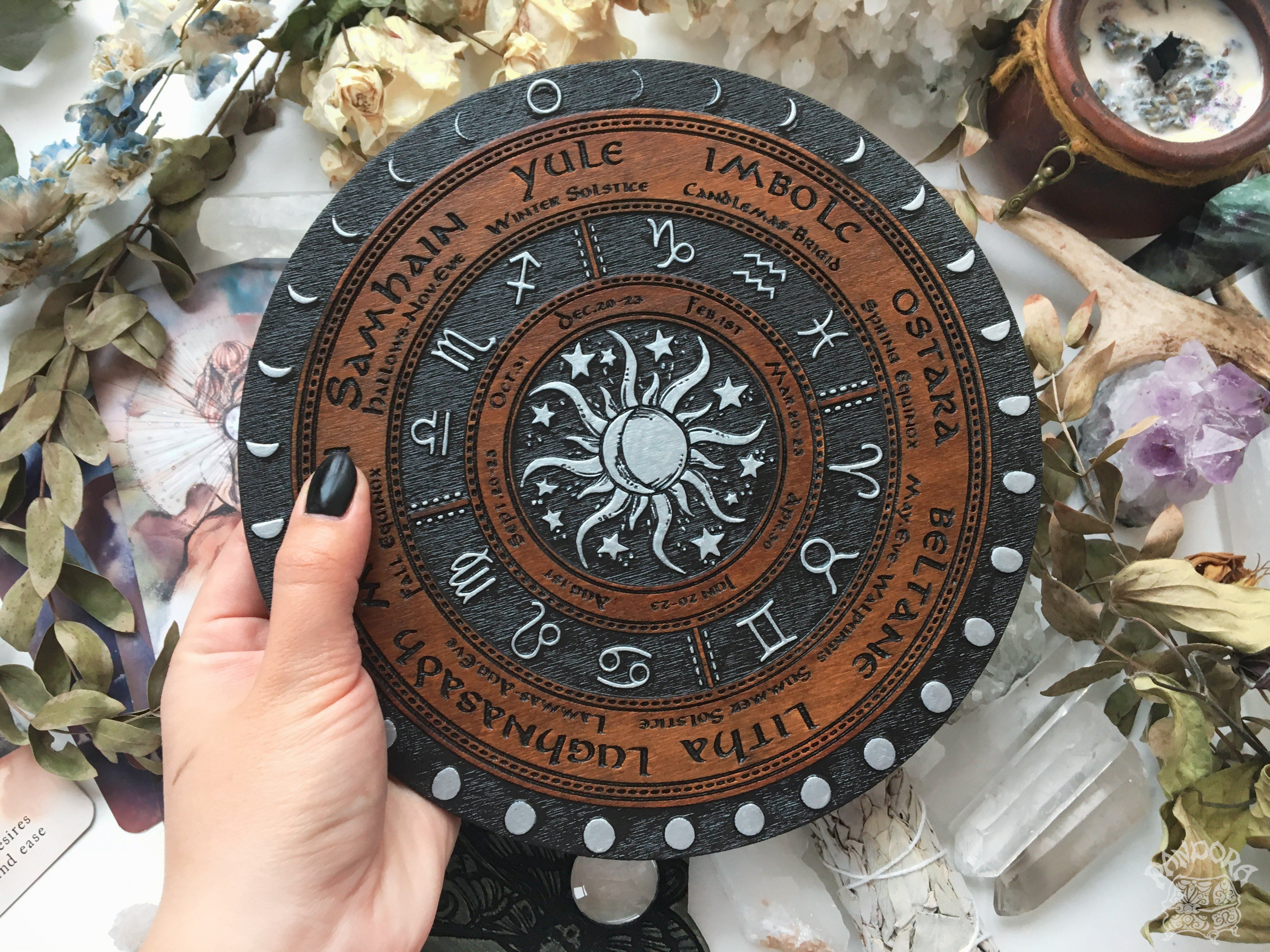 Wooden Wheel of the Year - calendar of pagan festivals and seasonal sabbaths: Yule, Imbolc, Ostara, Beltane, Litha, Lammas, Mabon, Samhain.