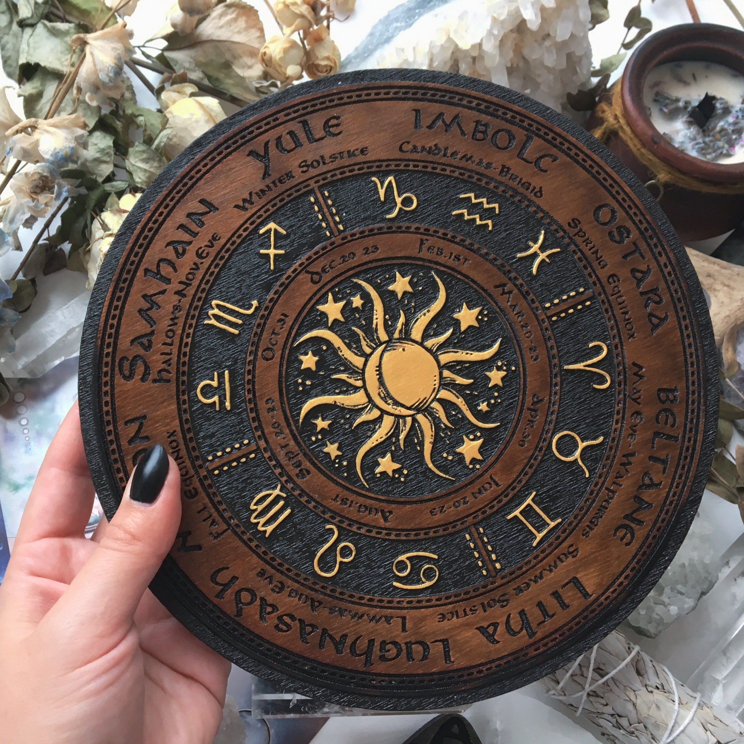 Wooden Wheel of the Year - calendar of pagan festivals and seasonal sabbaths: Yule, Imbolc, Ostara, Beltane, Litha, Lammas, Mabon, Samhain.