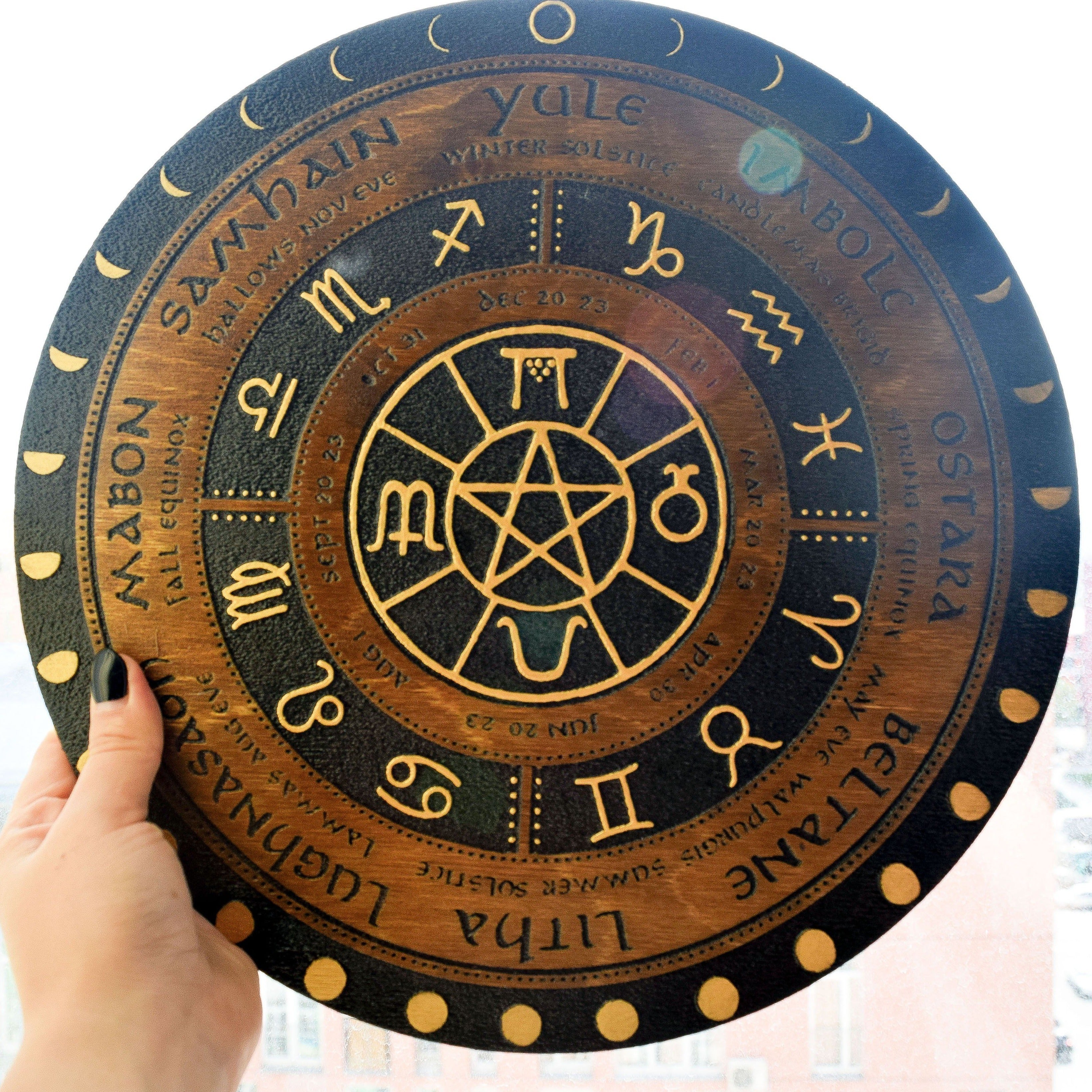 Wooden Wheel of the Year - calendar of pagan festivals and seasonal sabbaths: Yule, Imbolc, Ostara, Beltane, Litha, Lammas, Mabon, Samhain.