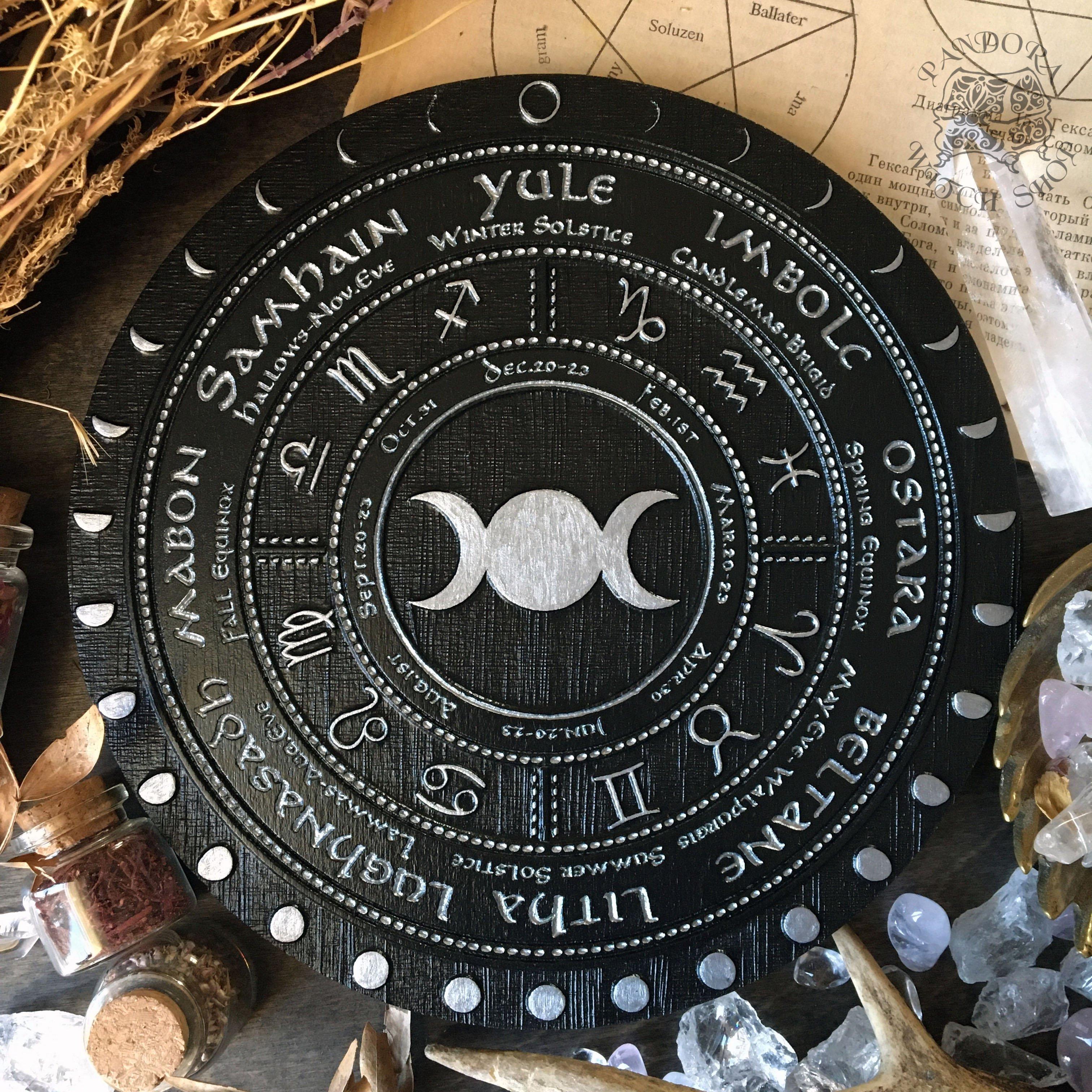 Wooden Wheel of the Year - calendar of pagan festivals and seasonal sabbaths: Yule, Imbolc, Ostara, Beltane, Litha, Lammas, Mabon, Samhain.