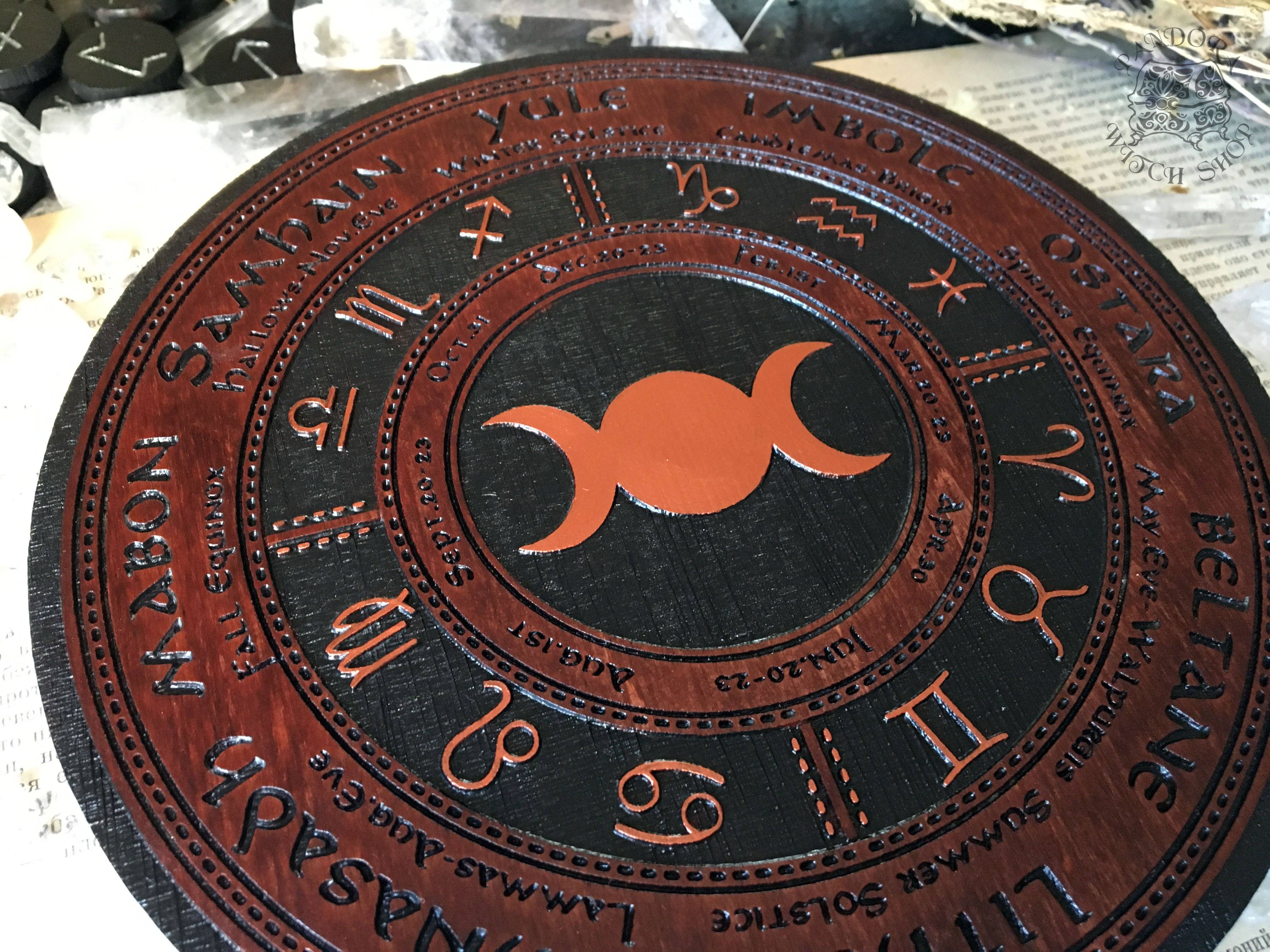 Wooden Wheel of the Year - calendar of pagan festivals and seasonal sabbaths: Yule, Imbolc, Ostara, Beltane, Litha, Lammas, Mabon, Samhain.