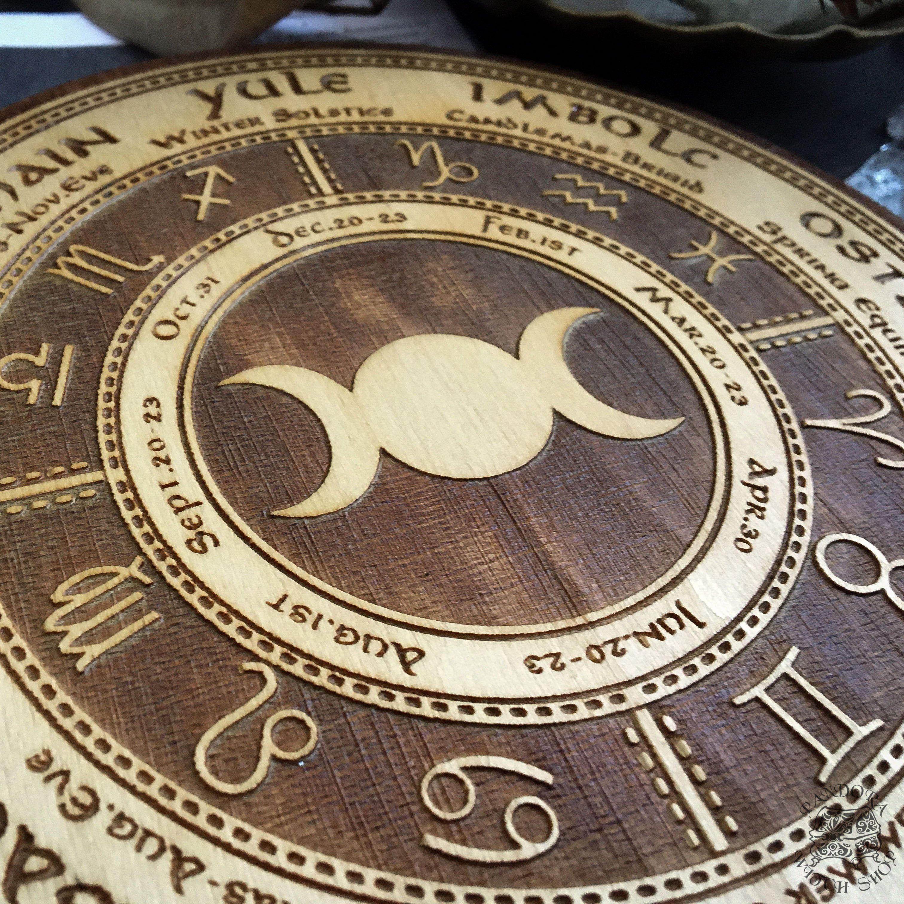 Wooden Wheel of the Year - calendar of pagan festivals and seasonal sabbaths: Yule, Imbolc, Ostara, Beltane, Litha, Lammas, Mabon, Samhain.