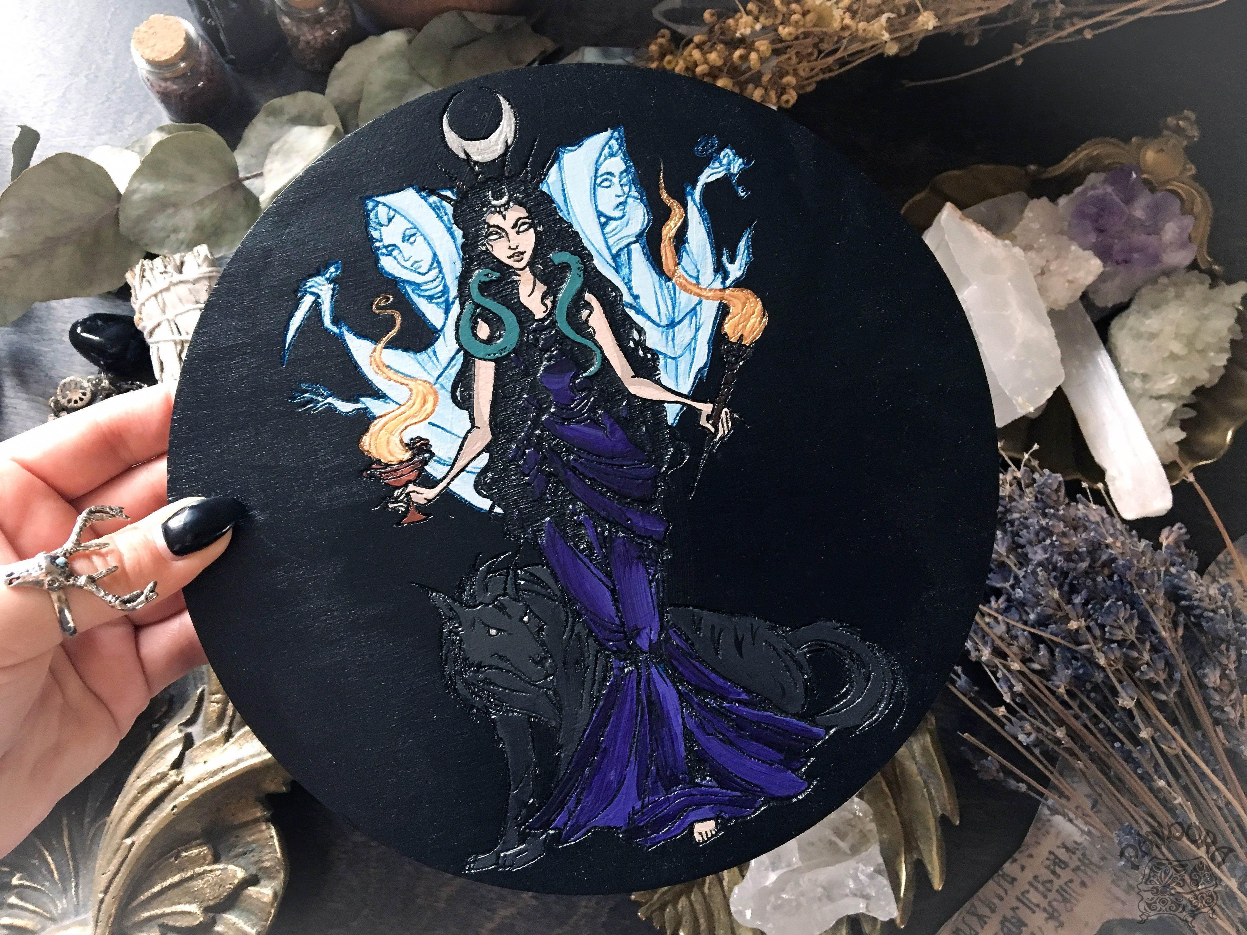 Wooden pentacle with engraving goddess Hecate (Hekate) from ancient Greek religion and mythology. Great goddess of witchcraft, crossroads, light, magic, knowledge and sorcery.