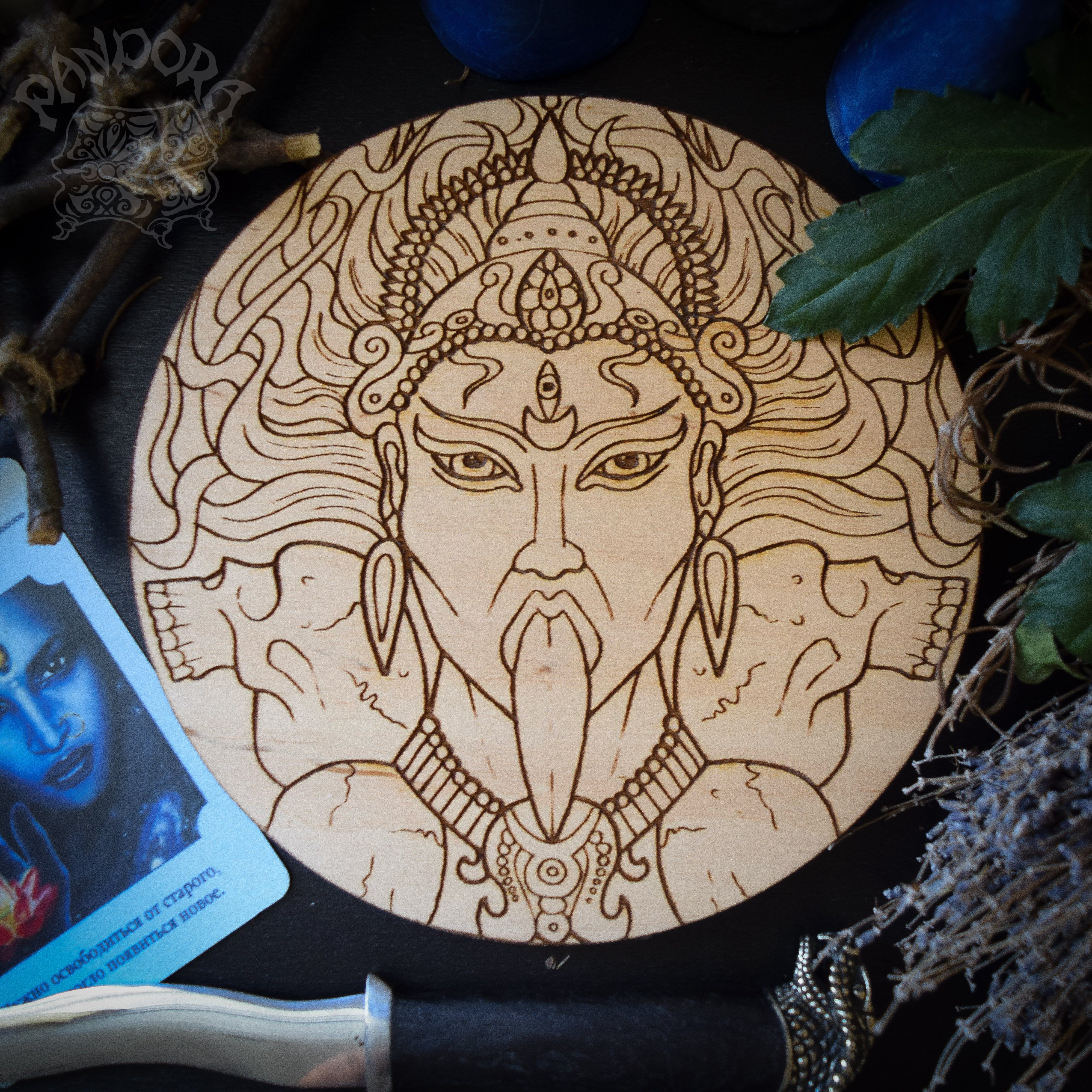 Wooden pentacle with engraving Kali - Hindu goddess (Devi) of Death, Time, Creation, Destruction and Power. Also known as Kālikā or Shyāmā.