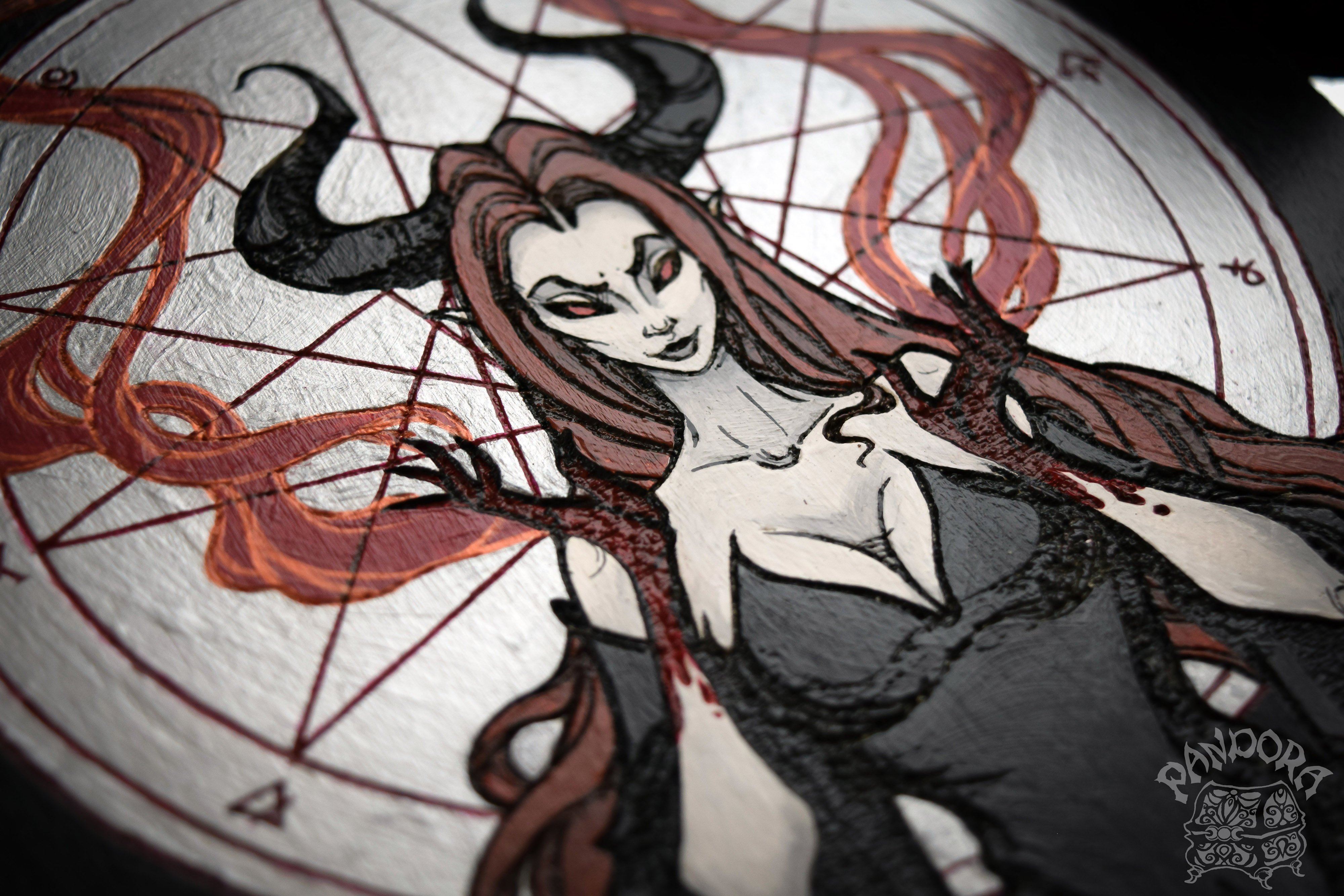 Wooden pentacle with engraving dark goddess Lilith. Often envisioned as a dangerous female demon.