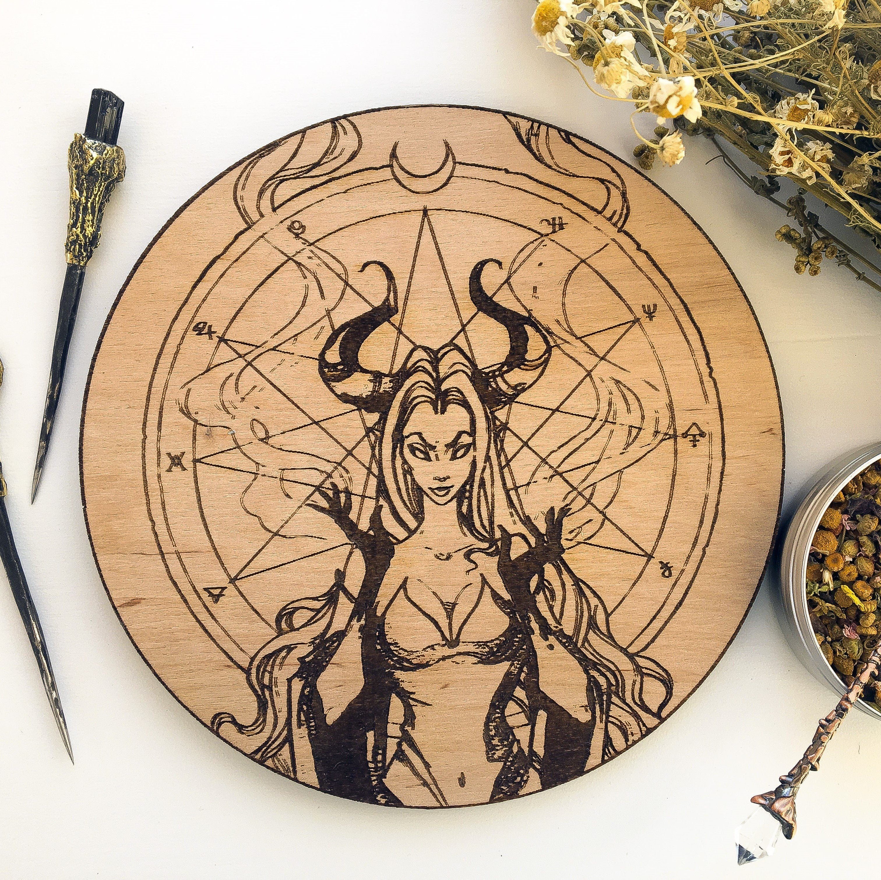 Wooden pentacle with engraving dark goddess Lilith. Often envisioned as a dangerous female demon.