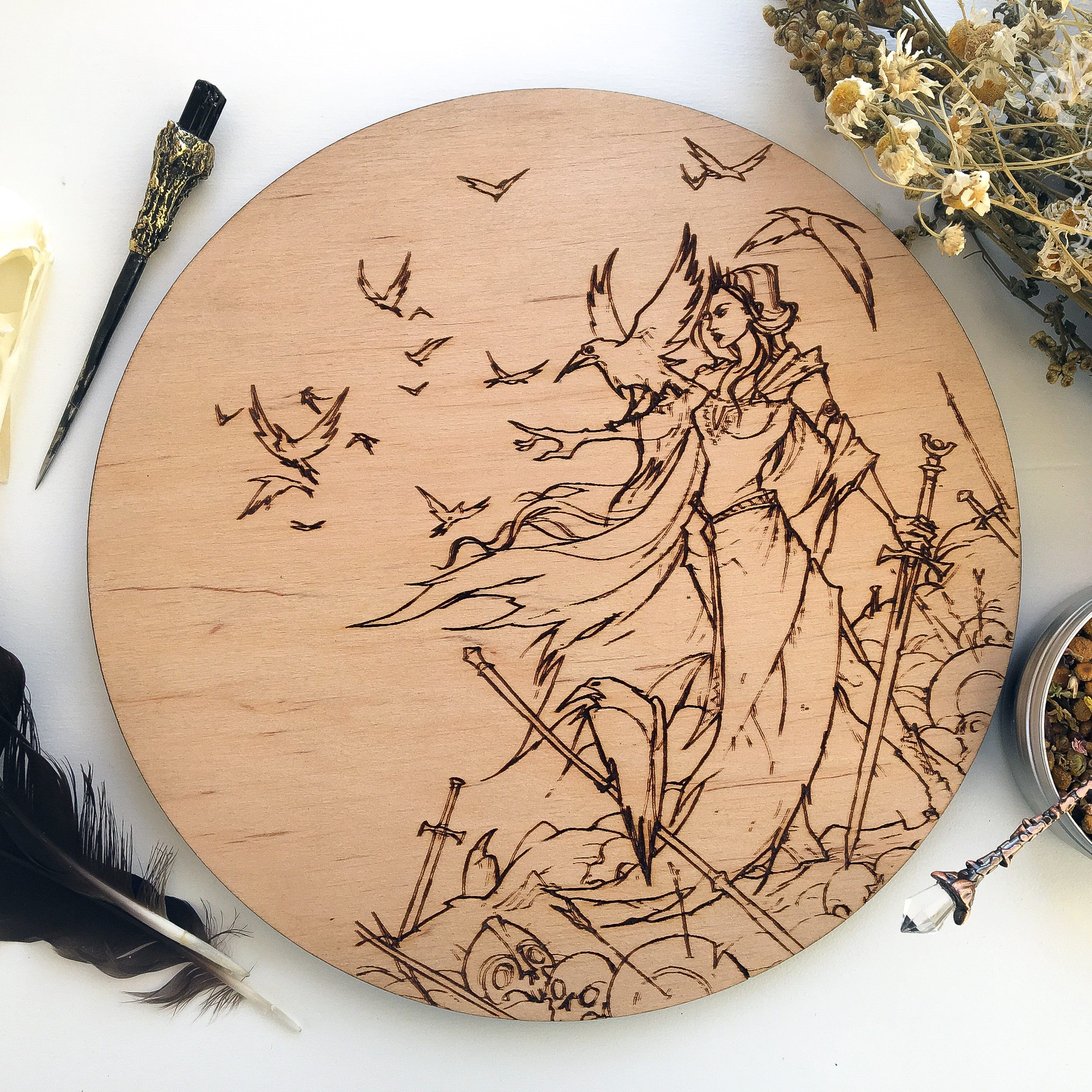 Wooden pentacle with engraving Morrigan goddess from Irish mythology. Also known as Morrigu. She is goddess of battle, fate and war.