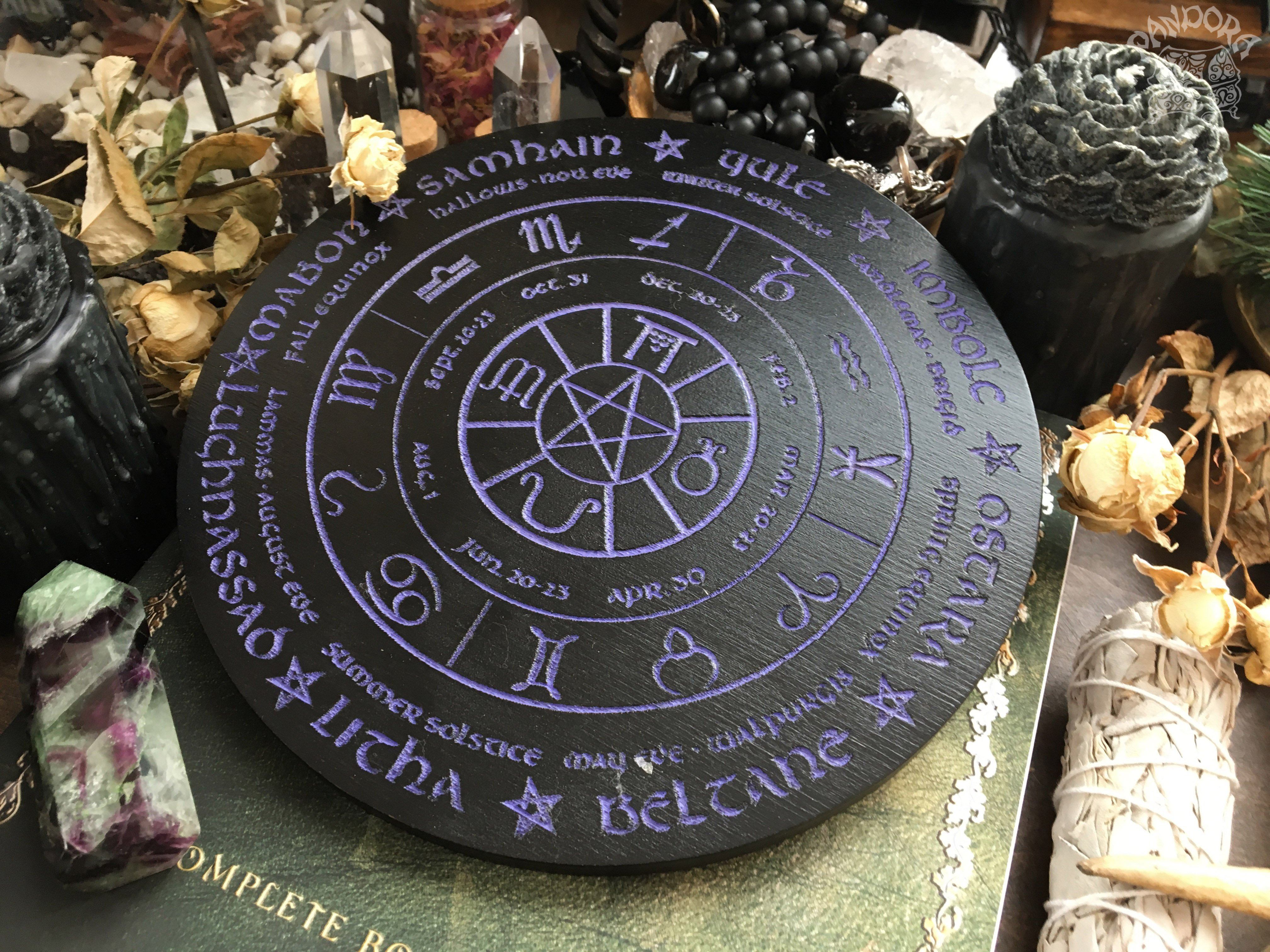Wooden Wheel of the Year - calendar of pagan festivals and seasonal sabbaths: Yule, Imbolc, Ostara, Beltane, Litha, Lammas, Mabon, Samhain.