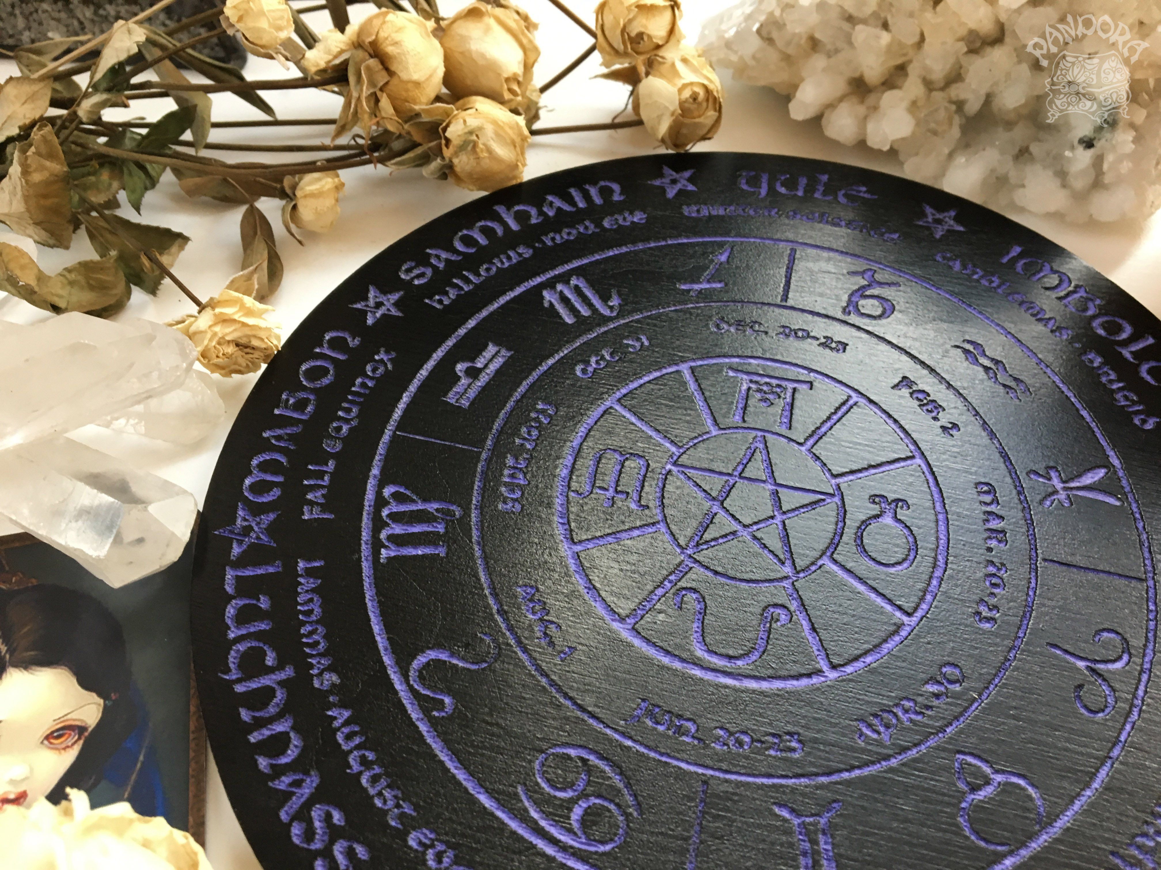 Wooden Wheel of the Year - calendar of pagan festivals and seasonal sabbaths: Yule, Imbolc, Ostara, Beltane, Litha, Lammas, Mabon, Samhain.