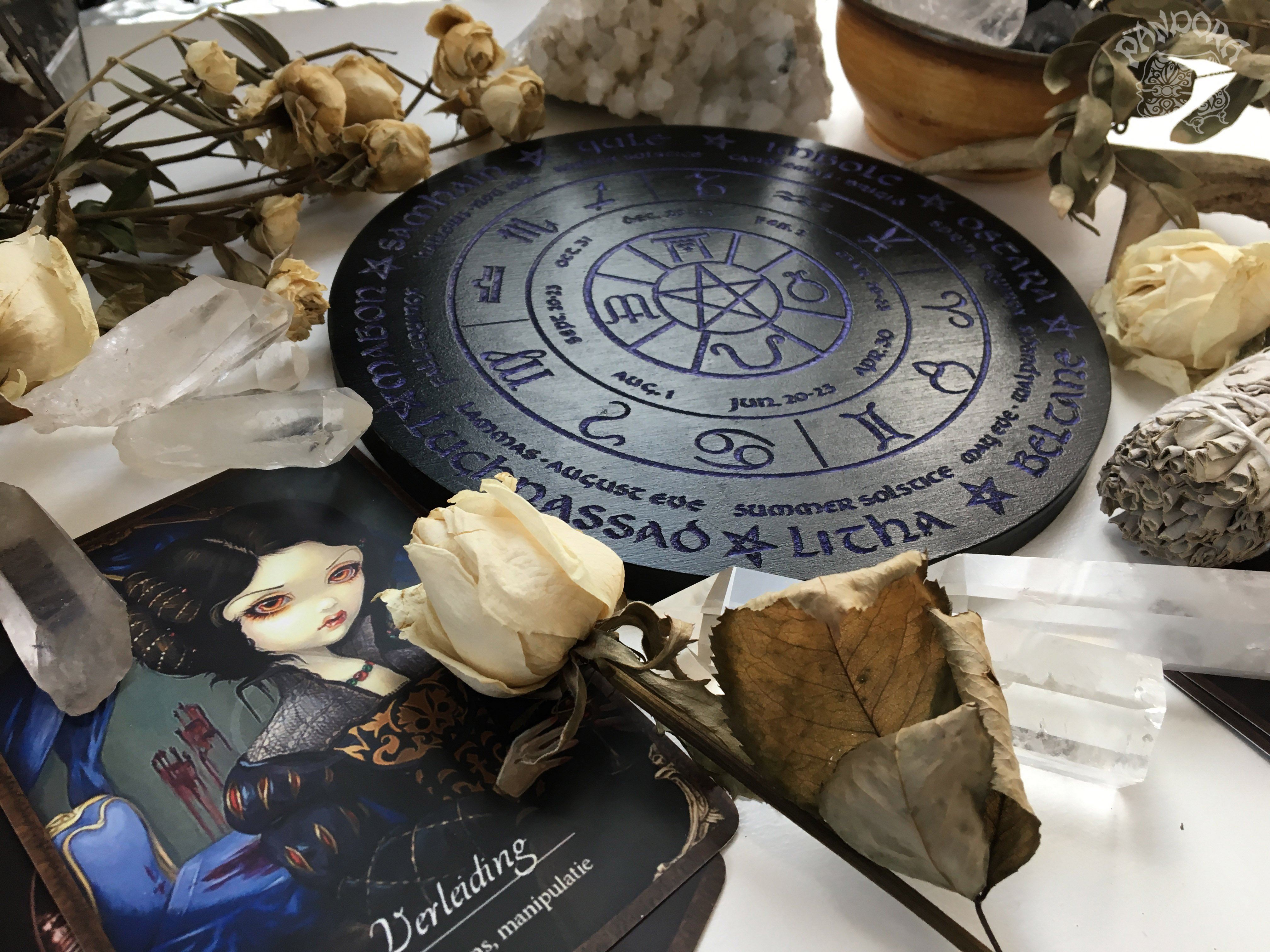 Wooden Wheel of the Year - calendar of pagan festivals and seasonal sabbaths: Yule, Imbolc, Ostara, Beltane, Litha, Lammas, Mabon, Samhain.
