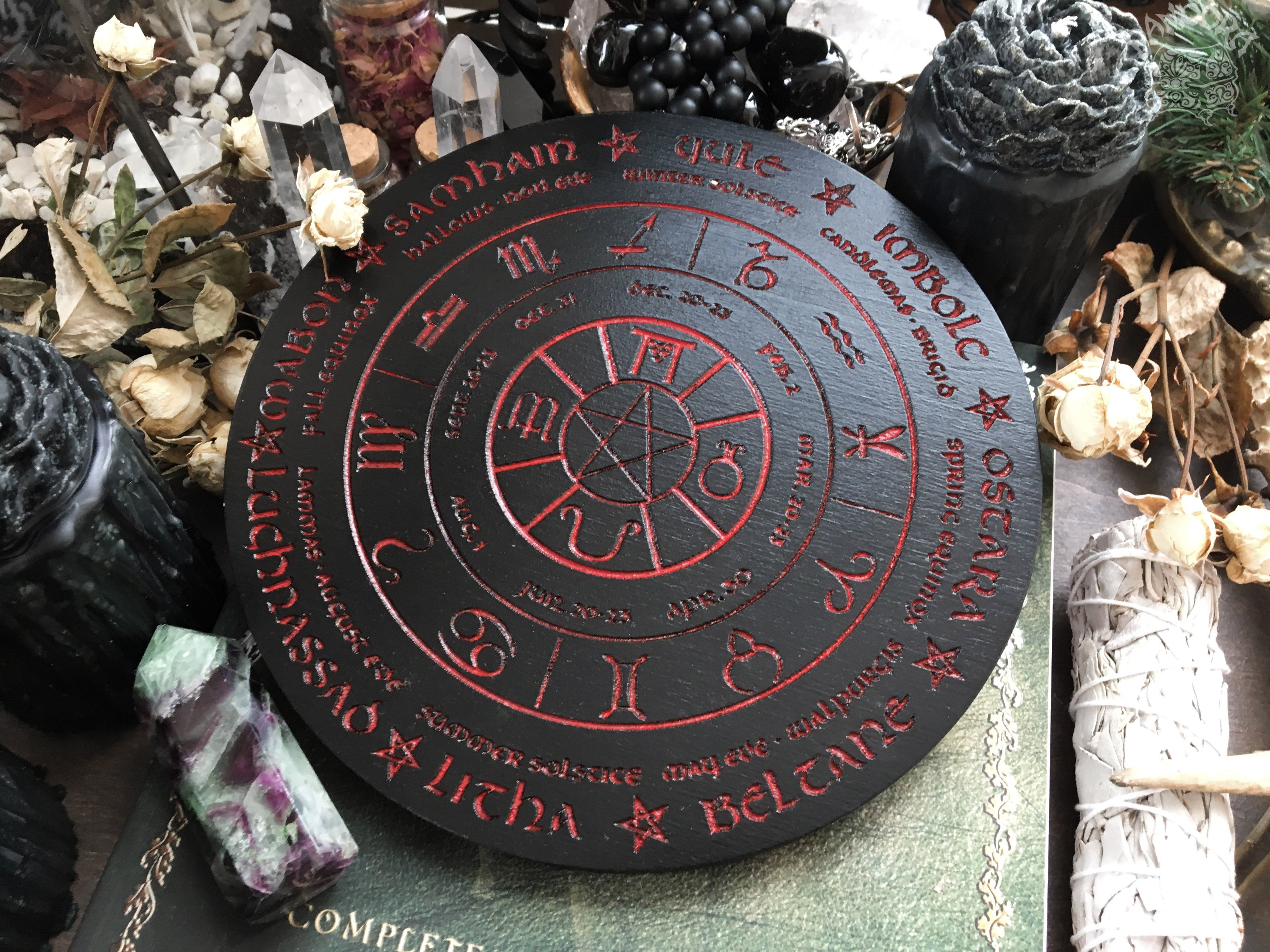 Wooden Wheel of the Year - calendar of pagan festivals and seasonal sabbaths: Yule, Imbolc, Ostara, Beltane, Litha, Lammas, Mabon, Samhain.