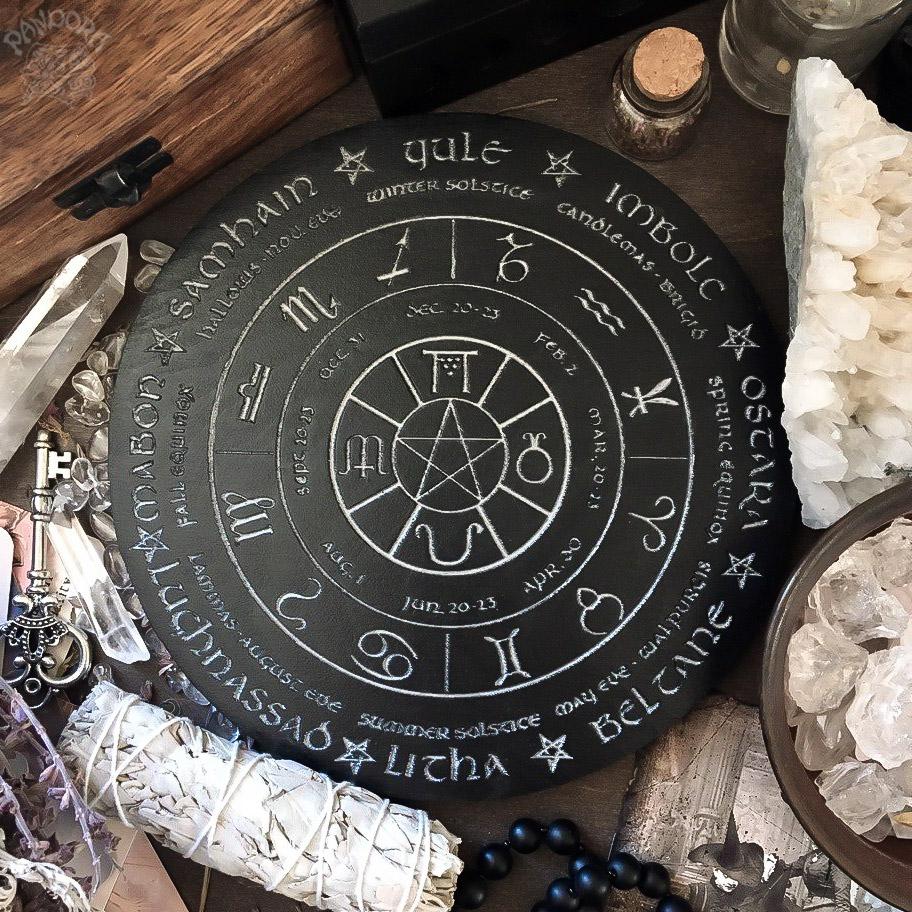 Wooden Wheel of the Year - calendar of pagan festivals and seasonal sabbaths: Yule, Imbolc, Ostara, Beltane, Litha, Lammas, Mabon, Samhain.
