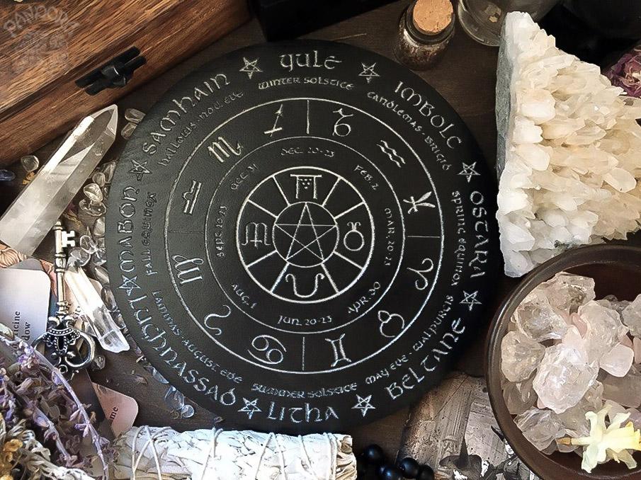 Wooden Wheel of the Year - calendar of pagan festivals and seasonal sabbaths: Yule, Imbolc, Ostara, Beltane, Litha, Lammas, Mabon, Samhain.
