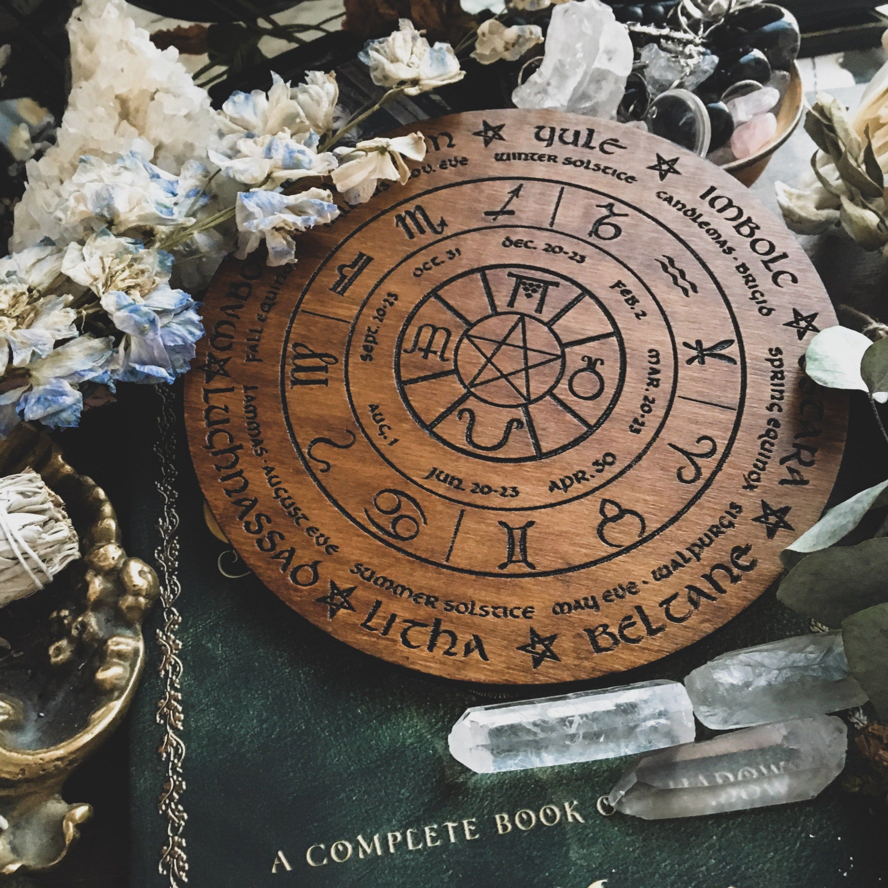 Wooden Wheel of the Year - calendar of pagan festivals and seasonal sabbaths: Yule, Imbolc, Ostara, Beltane, Litha, Lammas, Mabon, Samhain.
