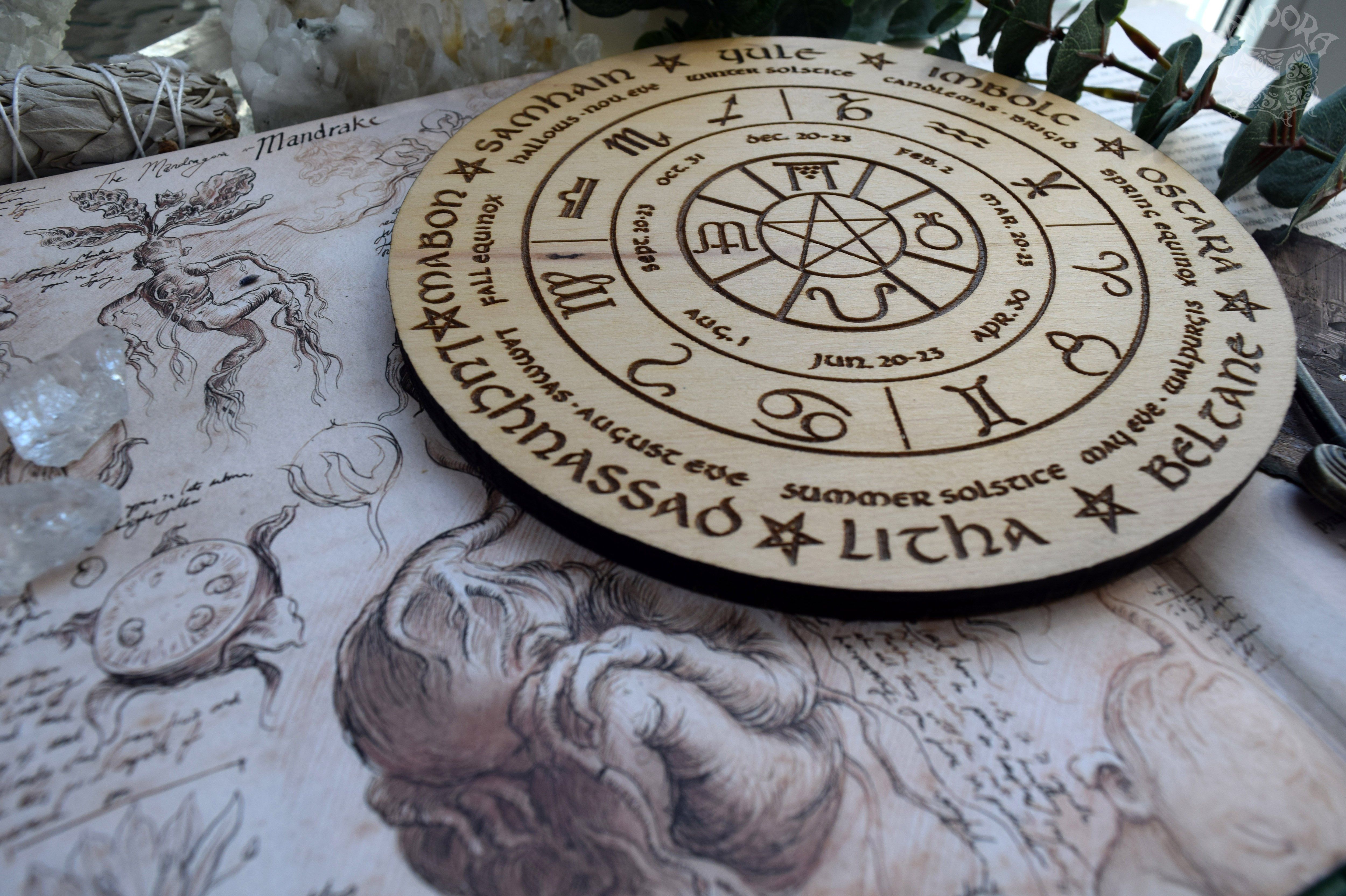 Wooden Wheel of the Year - calendar of pagan festivals and seasonal sabbaths: Yule, Imbolc, Ostara, Beltane, Litha, Lammas, Mabon, Samhain.