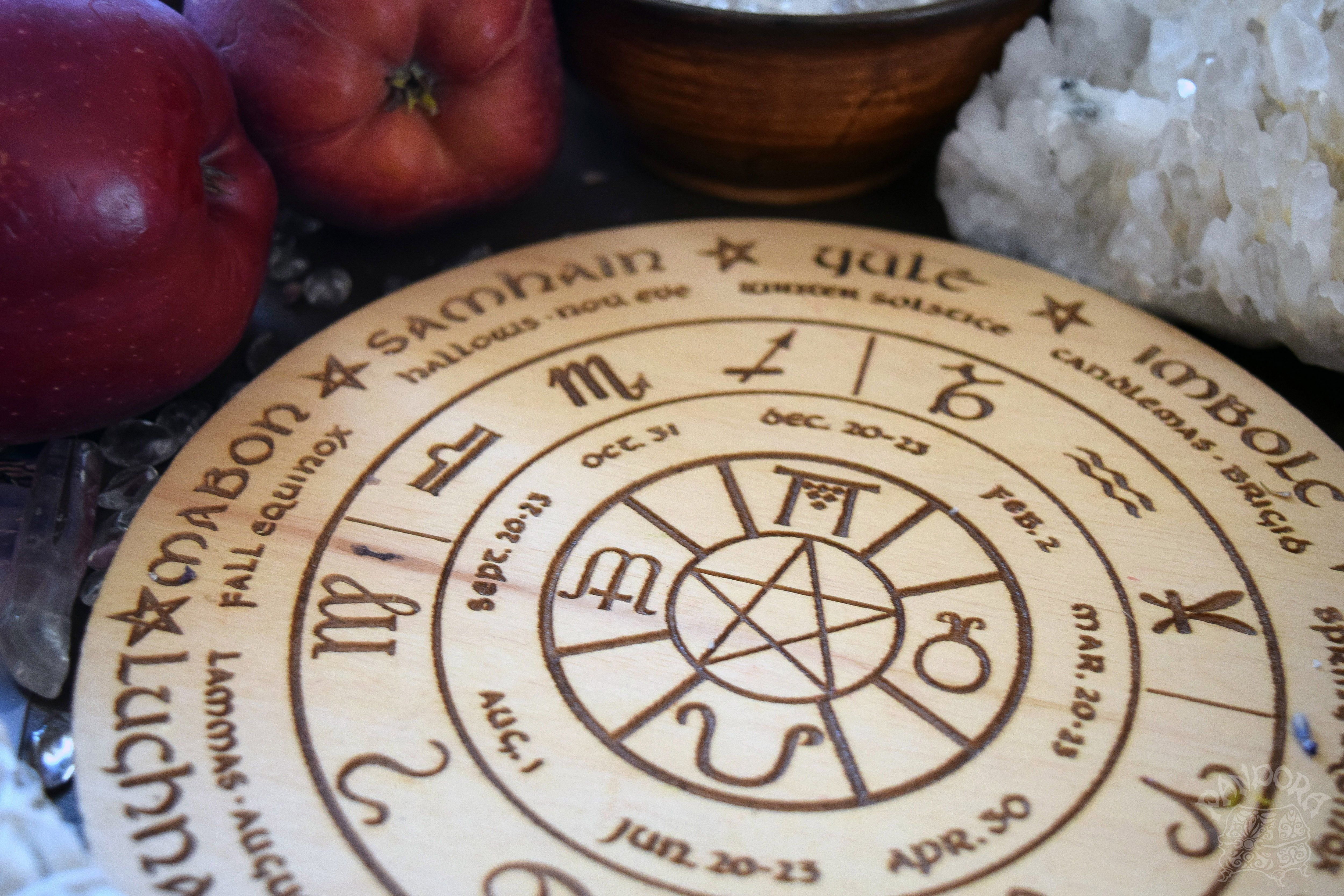Wooden Wheel of the Year - calendar of pagan festivals and seasonal sabbaths: Yule, Imbolc, Ostara, Beltane, Litha, Lammas, Mabon, Samhain.