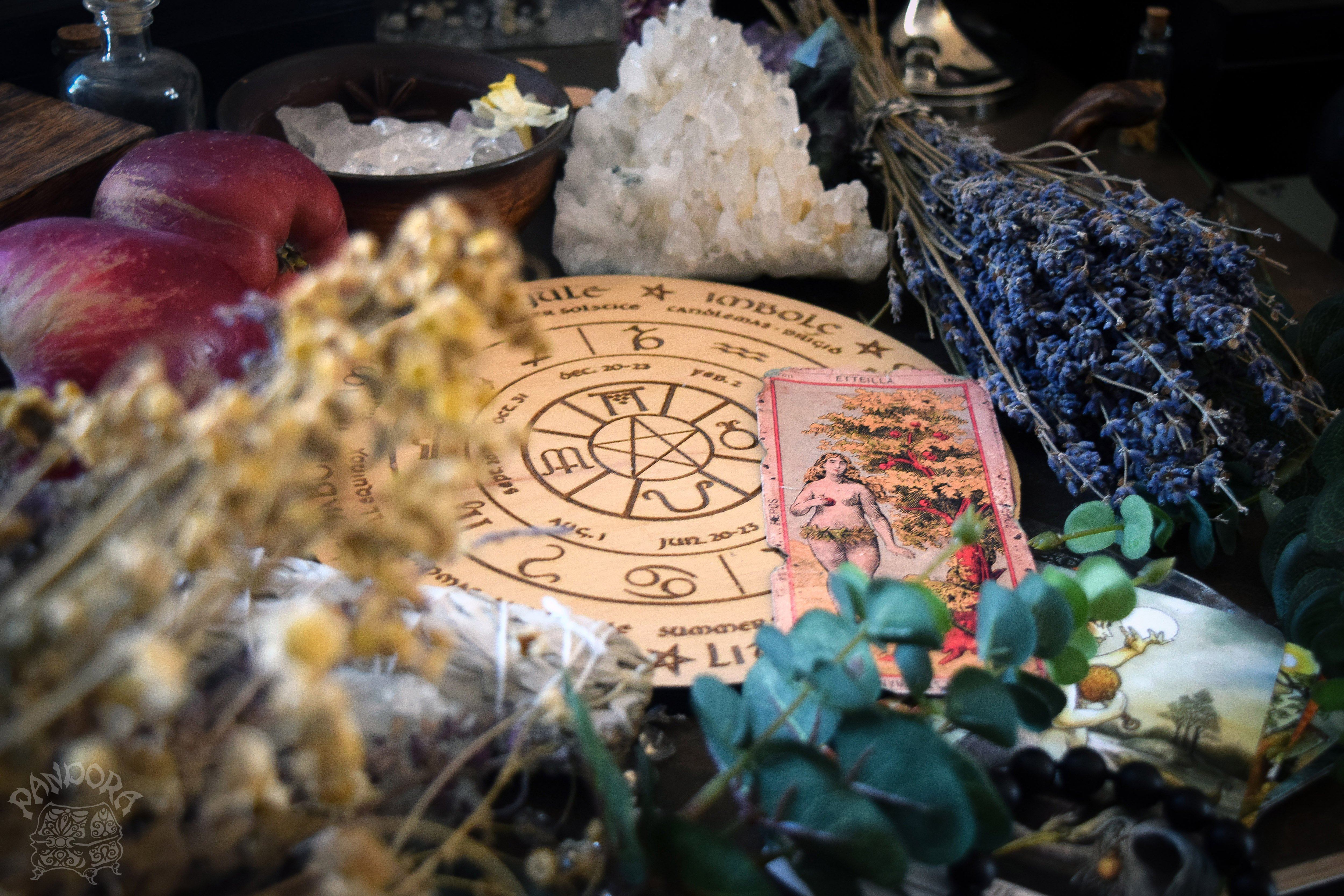 Wooden Wheel of the Year - calendar of pagan festivals and seasonal sabbaths: Yule, Imbolc, Ostara, Beltane, Litha, Lammas, Mabon, Samhain.