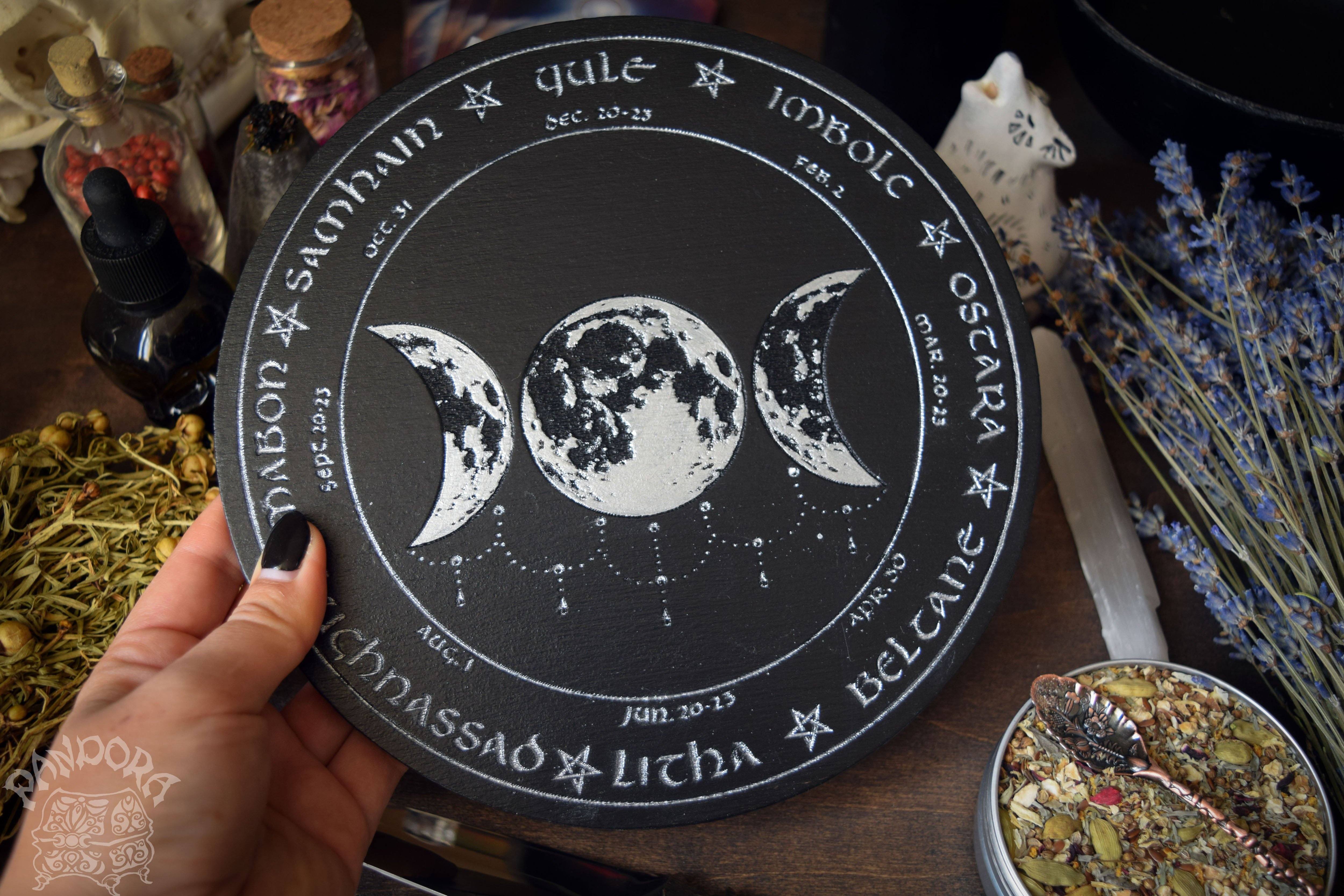 Wooden Wheel of the Year - calendar of pagan festivals and seasonal sabbaths: Yule, Imbolc, Ostara, Beltane, Litha, Lammas, Mabon, Samhain.