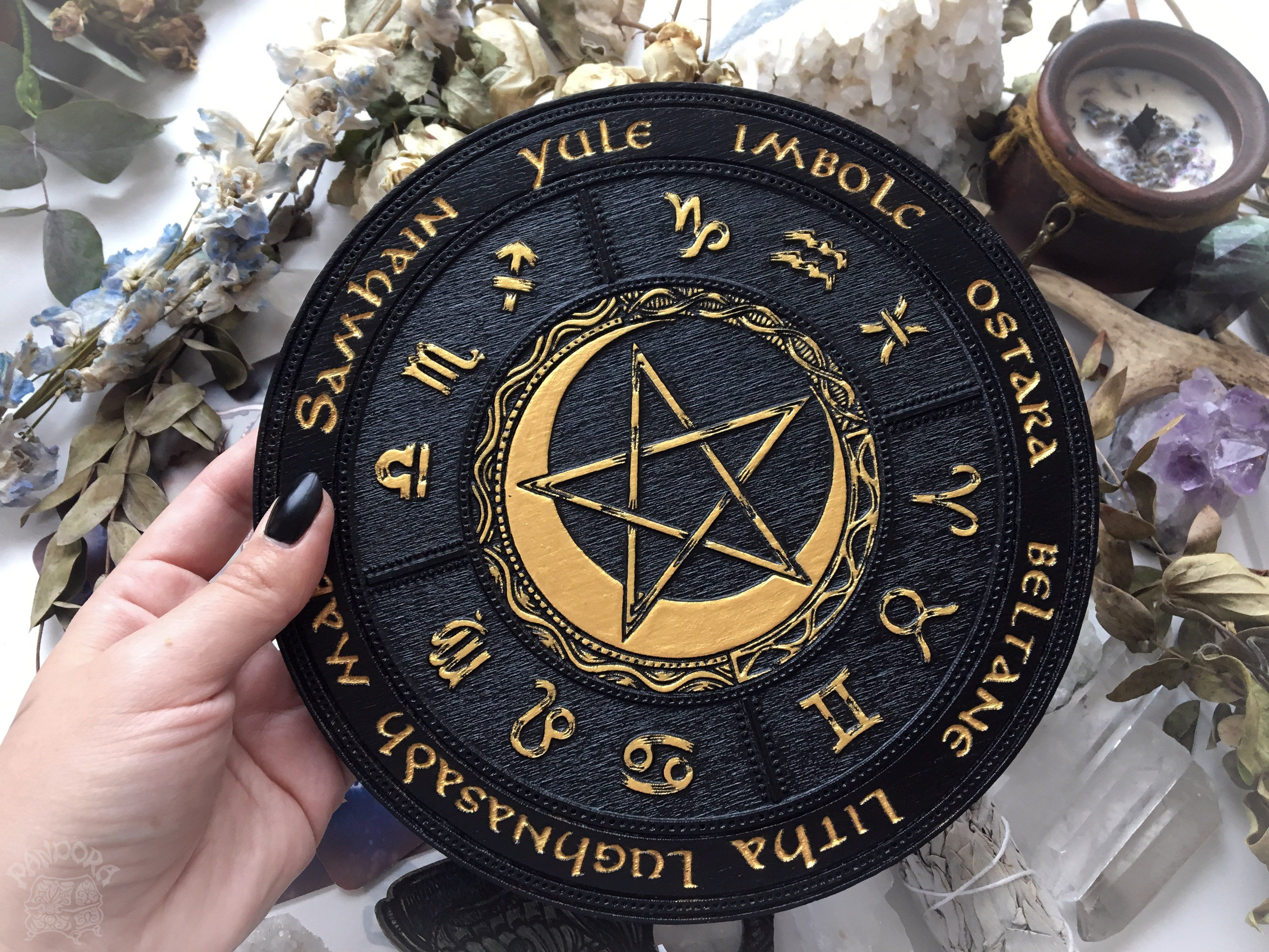 Wooden Wheel of the Year - calendar of pagan festivals and seasonal sabbaths: Yule, Imbolc, Ostara, Beltane, Litha, Lammas, Mabon, Samhain.