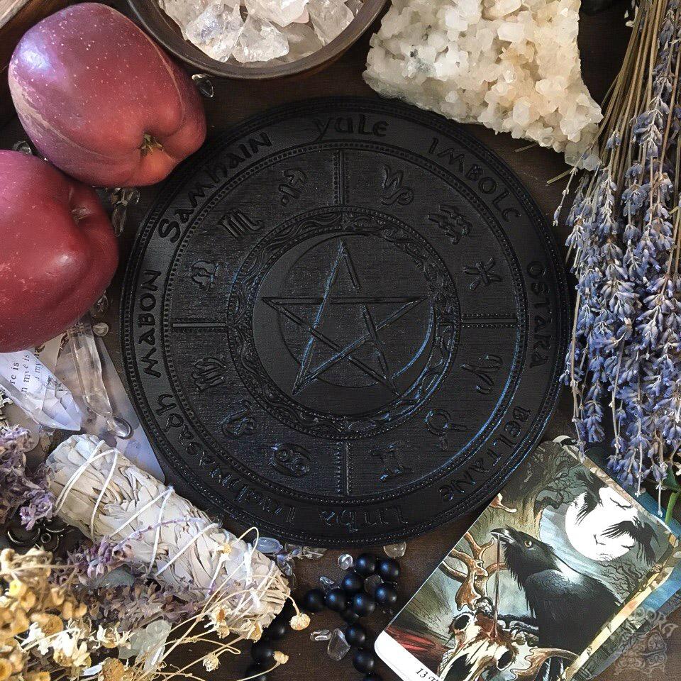 Wooden Wheel of the Year - calendar of pagan festivals and seasonal sabbaths: Yule, Imbolc, Ostara, Beltane, Litha, Lammas, Mabon, Samhain.