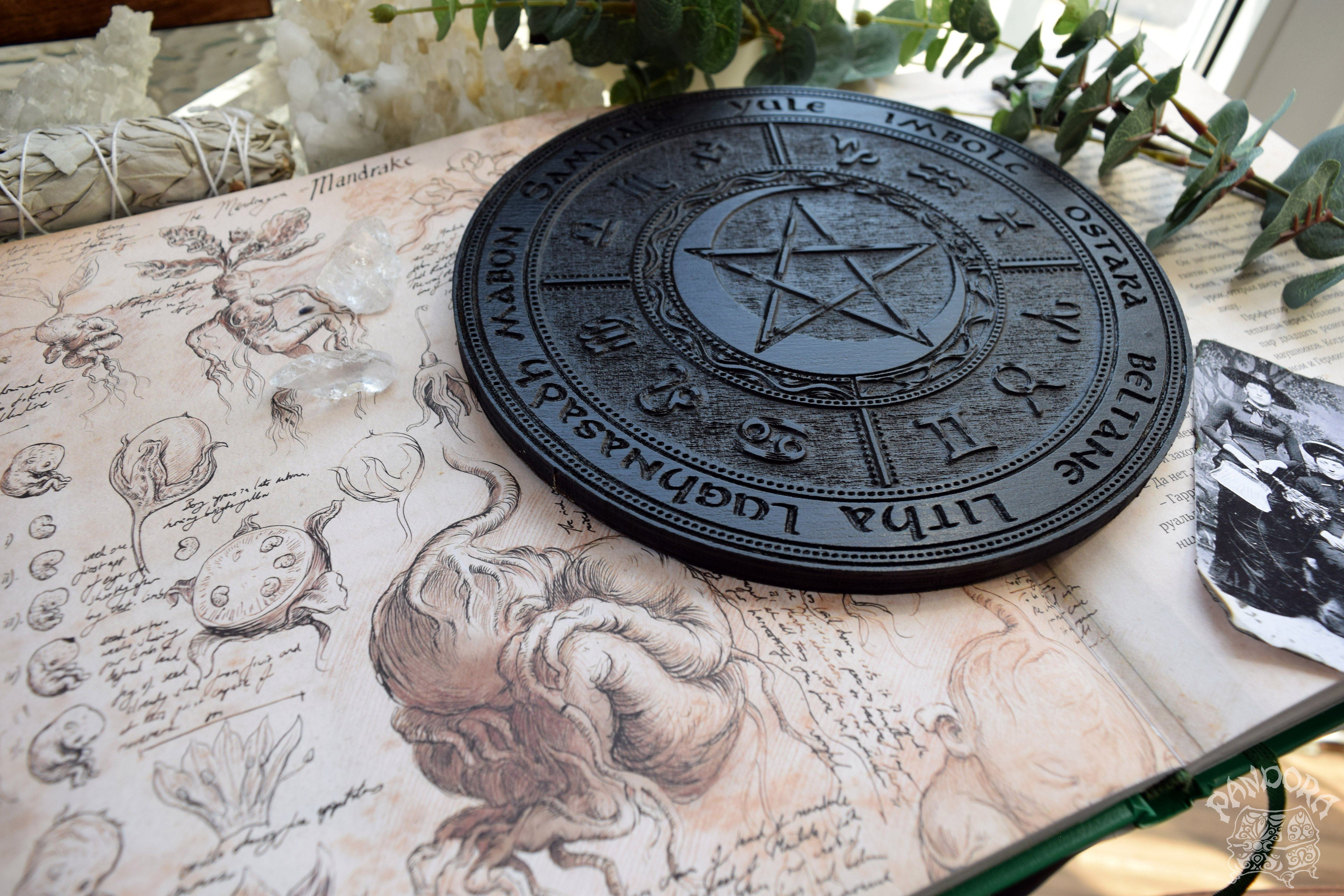 Wooden Wheel of the Year - calendar of pagan festivals and seasonal sabbaths: Yule, Imbolc, Ostara, Beltane, Litha, Lammas, Mabon, Samhain.