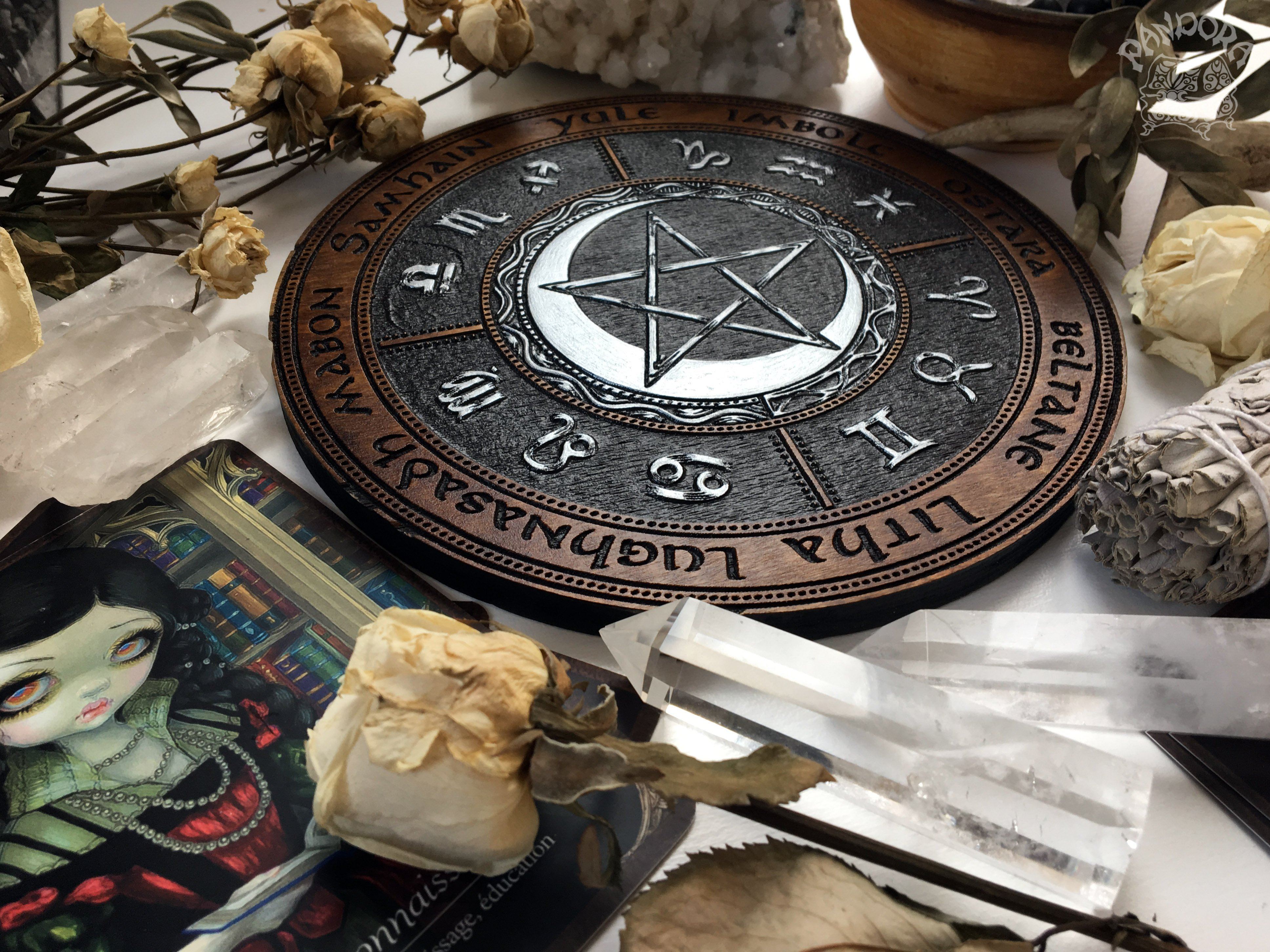 Wooden Wheel of the Year - calendar of pagan festivals and seasonal sabbaths: Yule, Imbolc, Ostara, Beltane, Litha, Lammas, Mabon, Samhain.