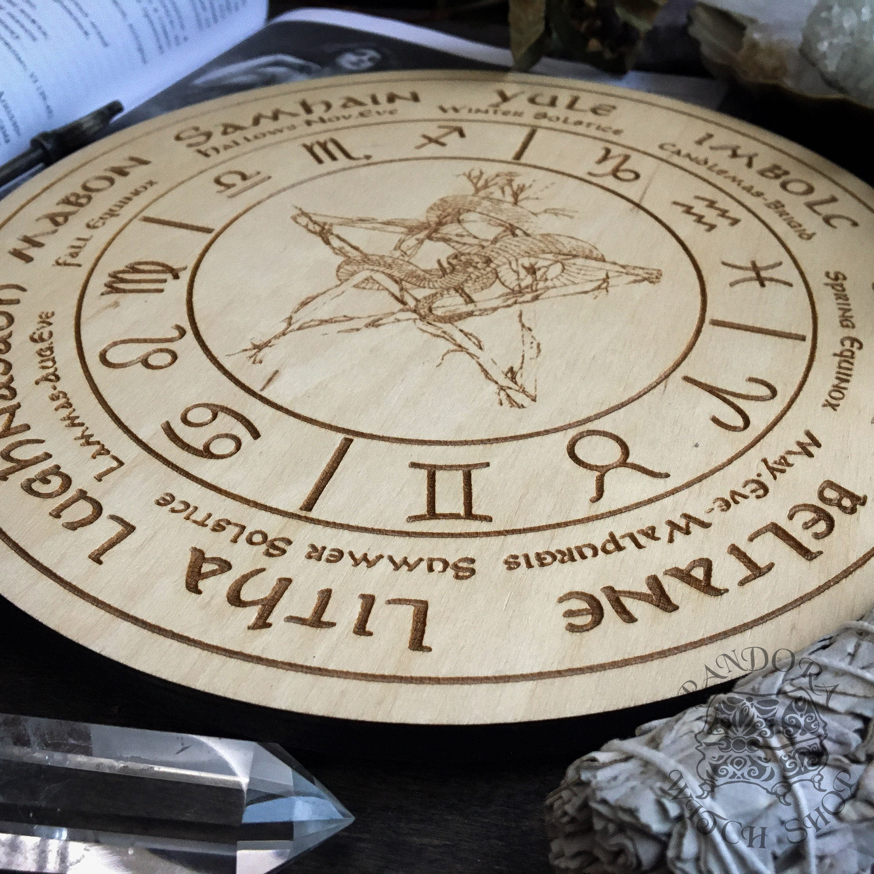 Wooden Wheel of the Year - calendar of pagan festivals and seasonal sabbaths: Yule, Imbolc, Ostara, Beltane, Litha, Lammas, Mabon, Samhain.