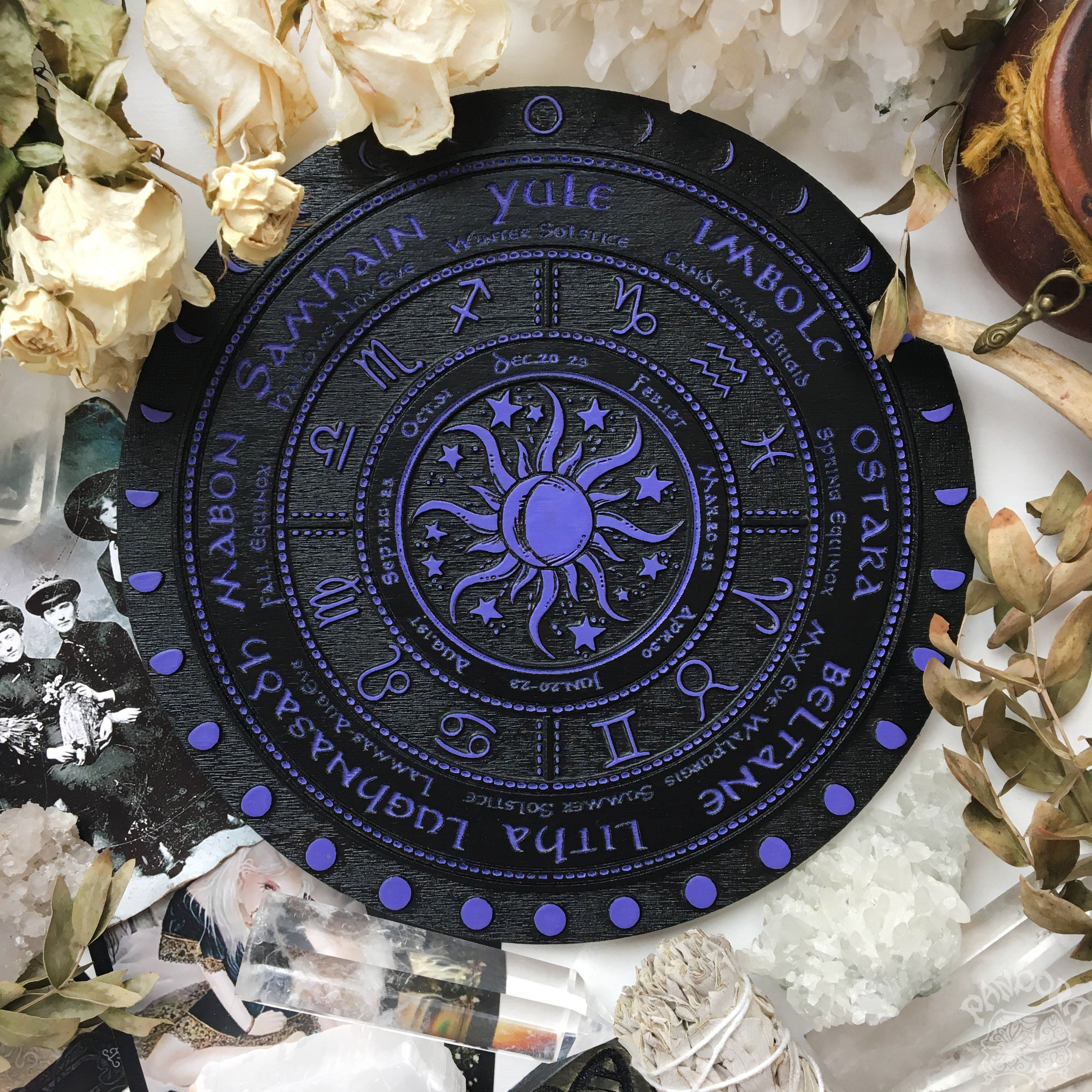 Wooden Wheel of the Year - calendar of pagan festivals and seasonal sabbaths: Yule, Imbolc, Ostara, Beltane, Litha, Lammas, Mabon, Samhain.