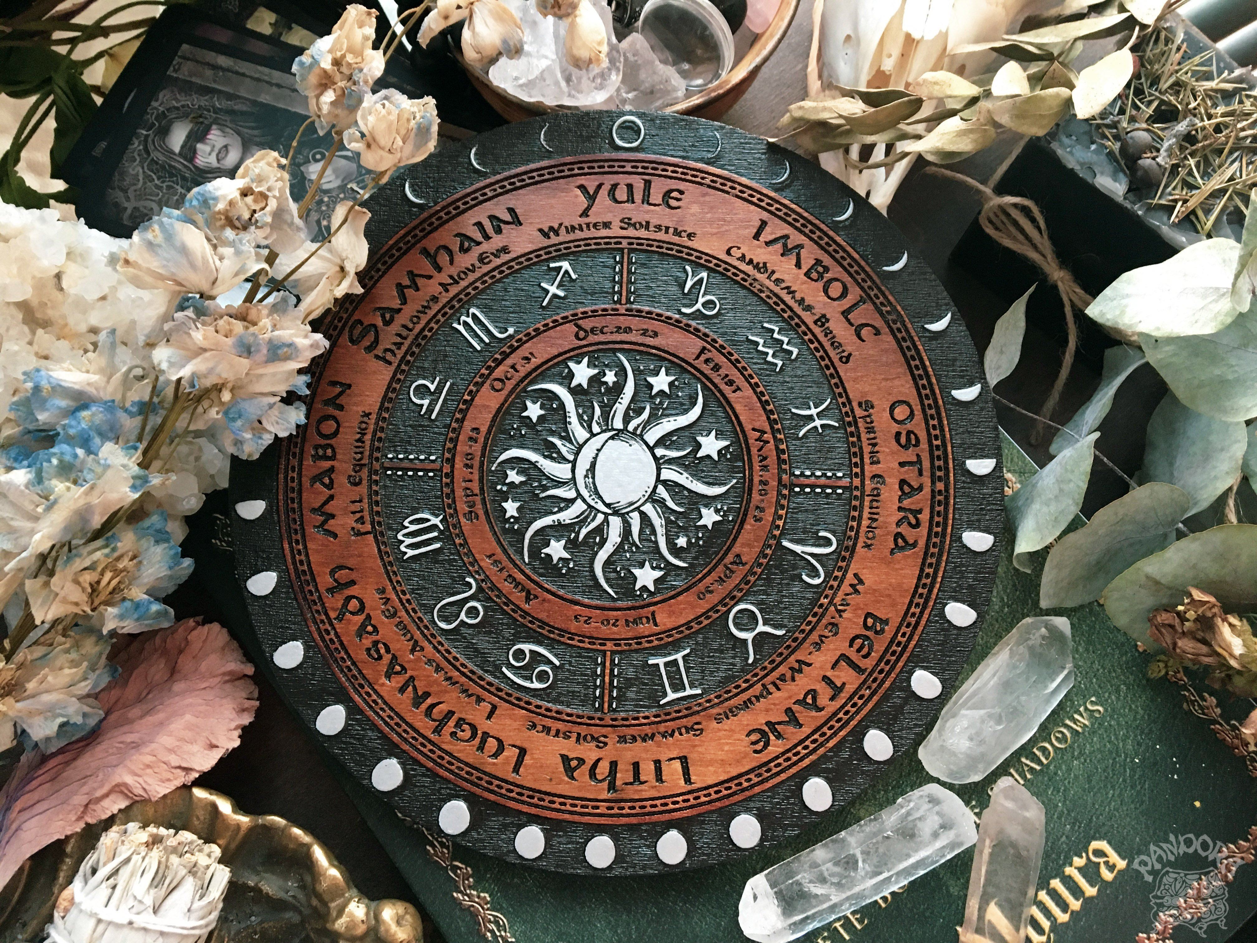 Wooden Wheel of the Year - calendar of pagan festivals and seasonal sabbaths: Yule, Imbolc, Ostara, Beltane, Litha, Lammas, Mabon, Samhain.