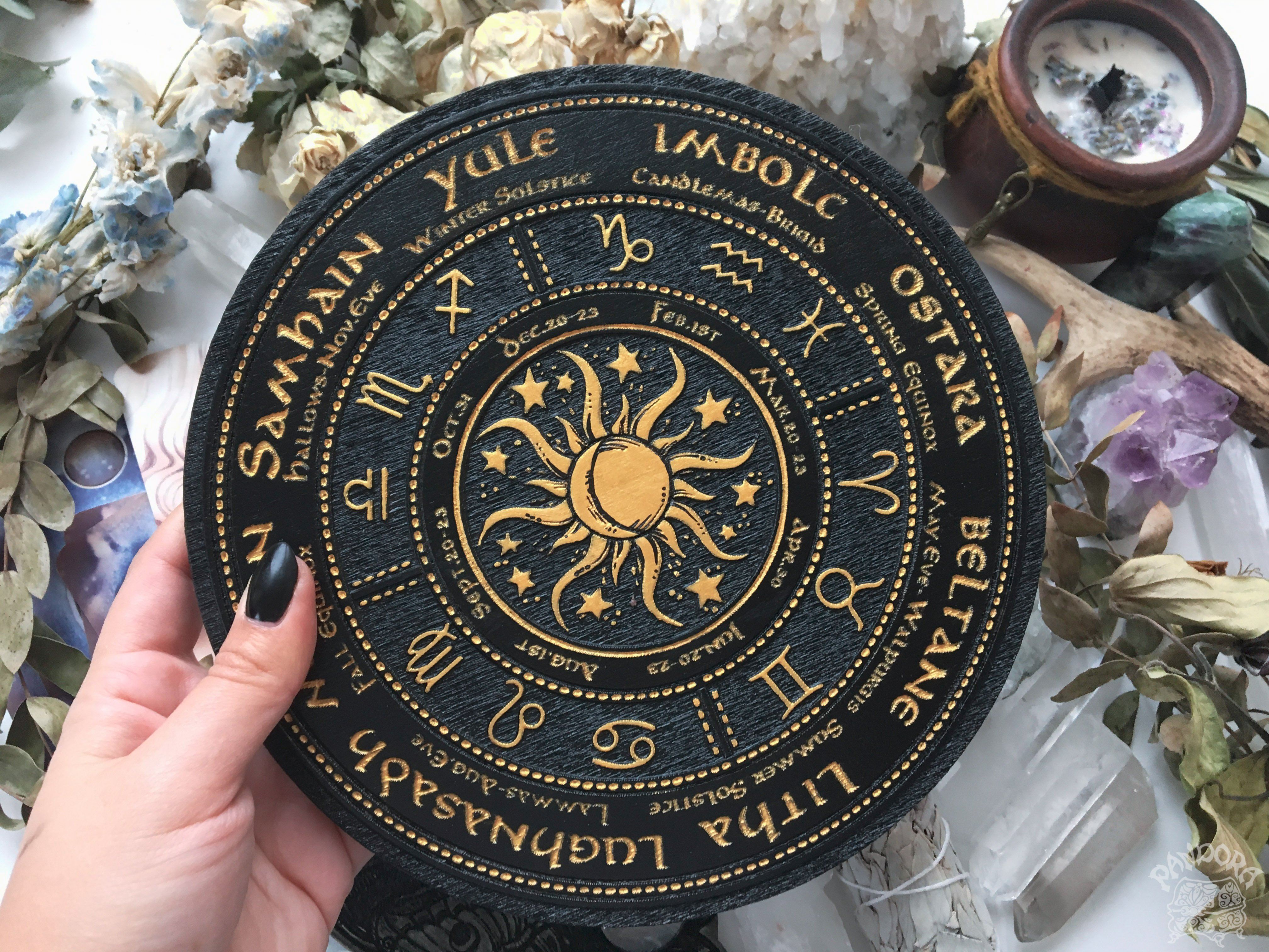 Wooden Wheel of the Year - calendar of pagan festivals and seasonal sabbaths: Yule, Imbolc, Ostara, Beltane, Litha, Lammas, Mabon, Samhain.