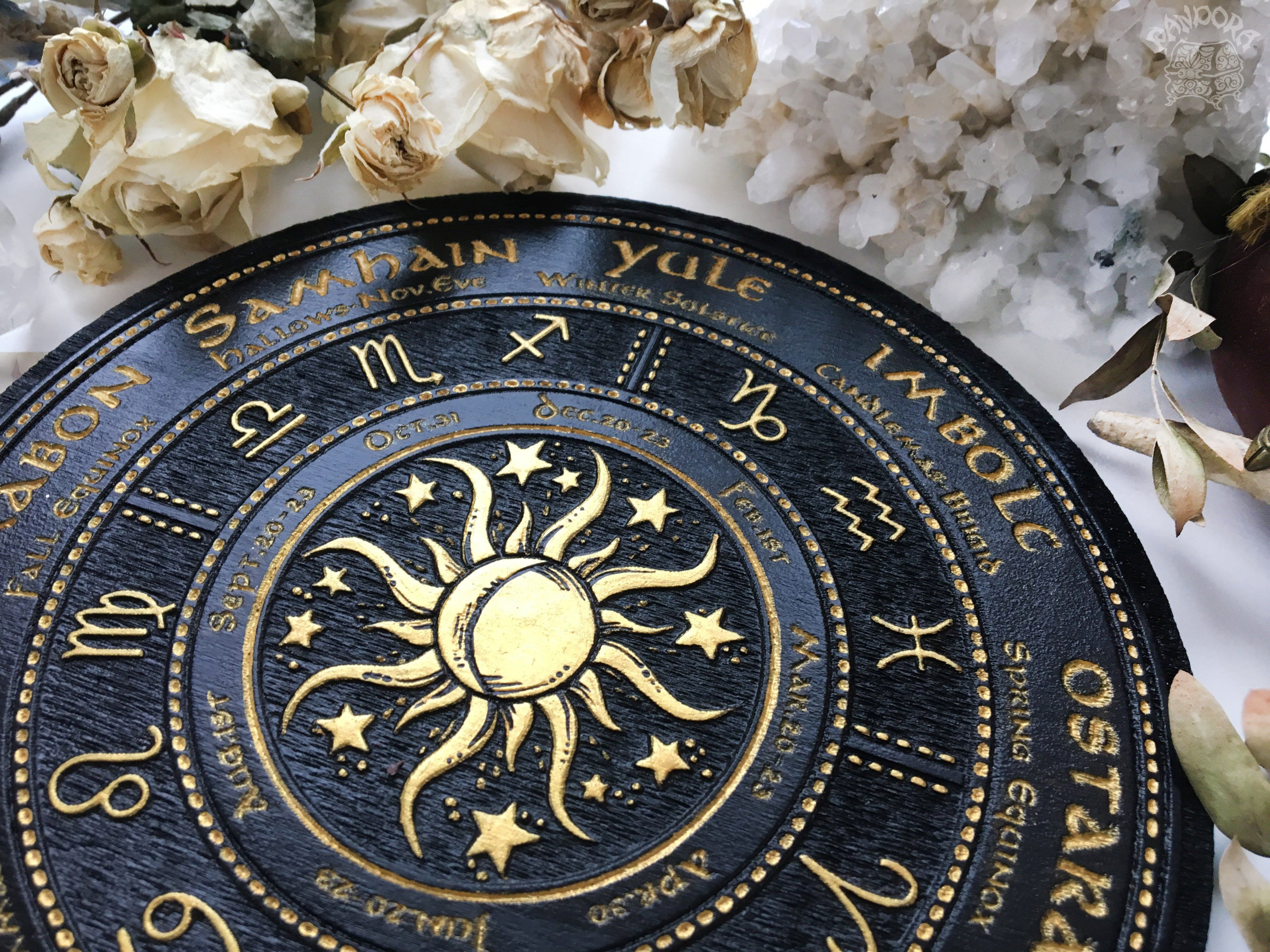 Wooden Wheel of the Year - calendar of pagan festivals and seasonal sabbaths: Yule, Imbolc, Ostara, Beltane, Litha, Lammas, Mabon, Samhain.