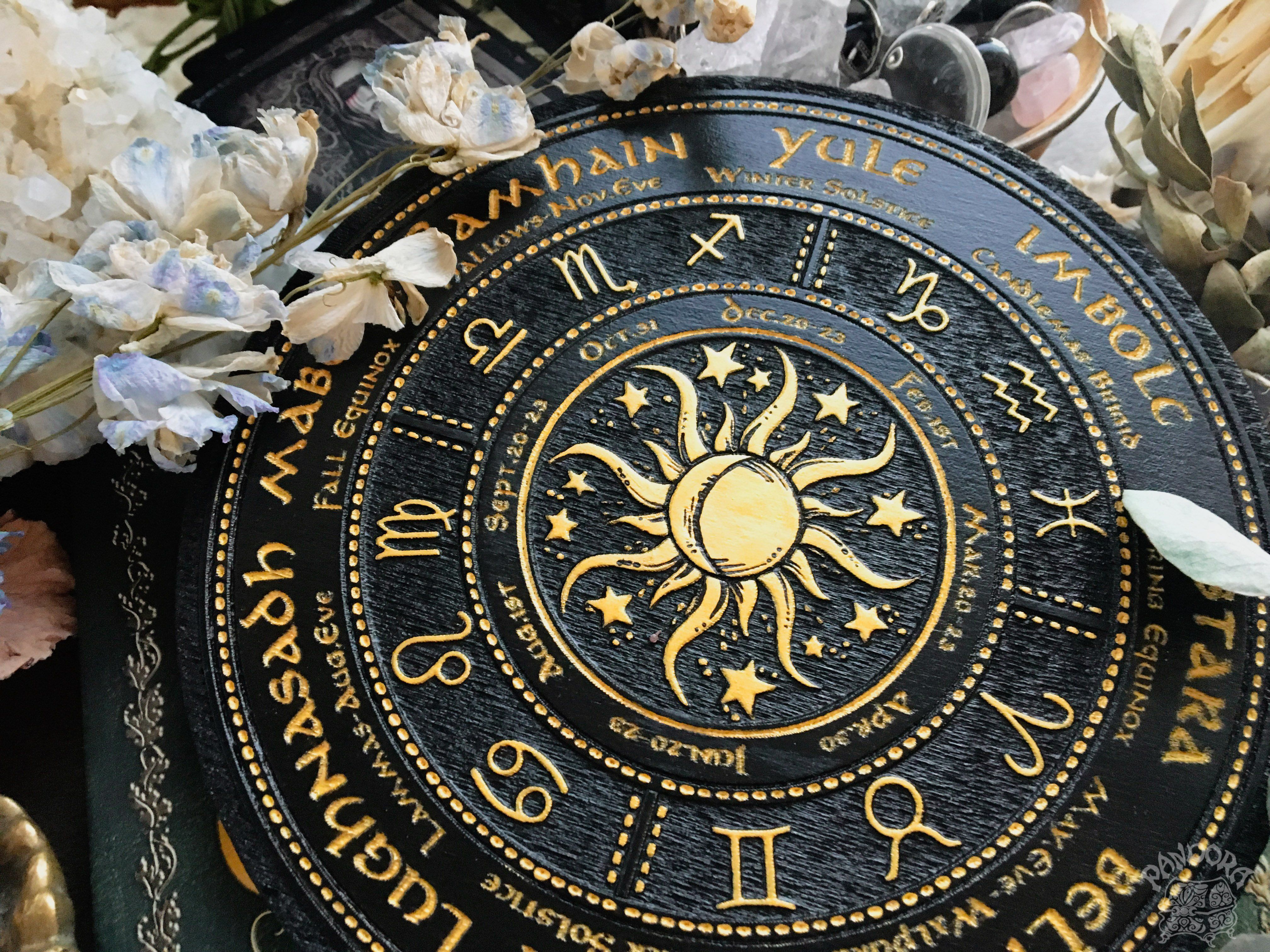 Wooden Wheel of the Year - calendar of pagan festivals and seasonal sabbaths: Yule, Imbolc, Ostara, Beltane, Litha, Lammas, Mabon, Samhain.