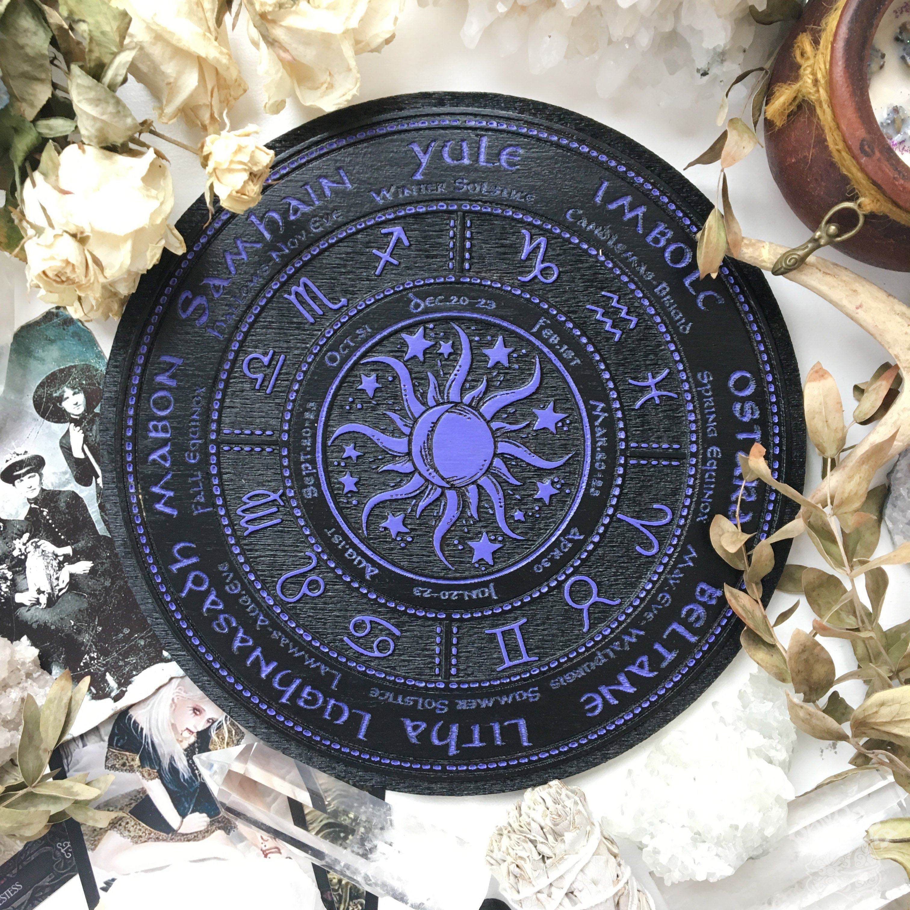 Wooden Wheel of the Year - calendar of pagan festivals and seasonal sabbaths: Yule, Imbolc, Ostara, Beltane, Litha, Lammas, Mabon, Samhain.