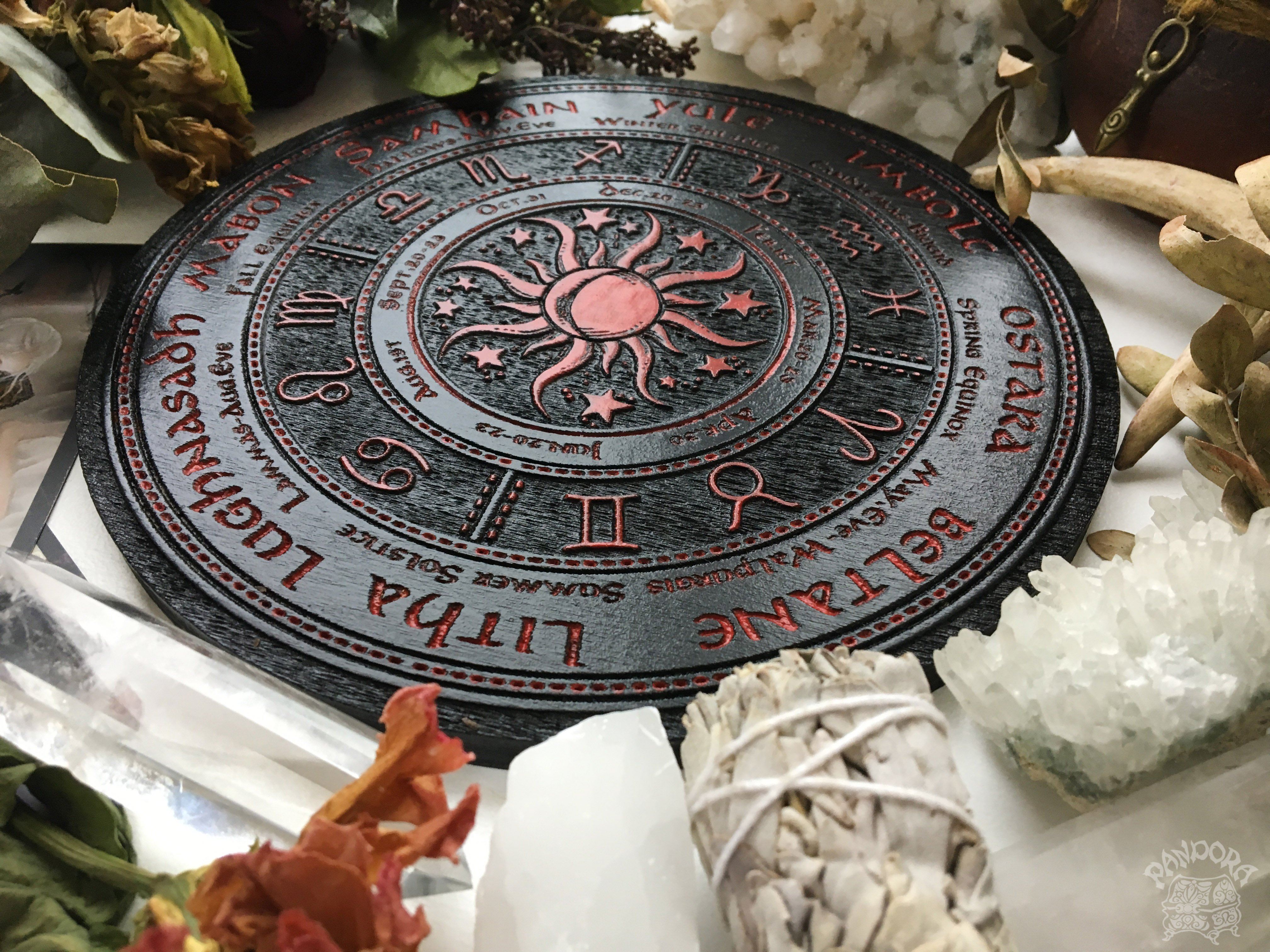 Wooden Wheel of the Year - calendar of pagan festivals and seasonal sabbaths: Yule, Imbolc, Ostara, Beltane, Litha, Lammas, Mabon, Samhain.