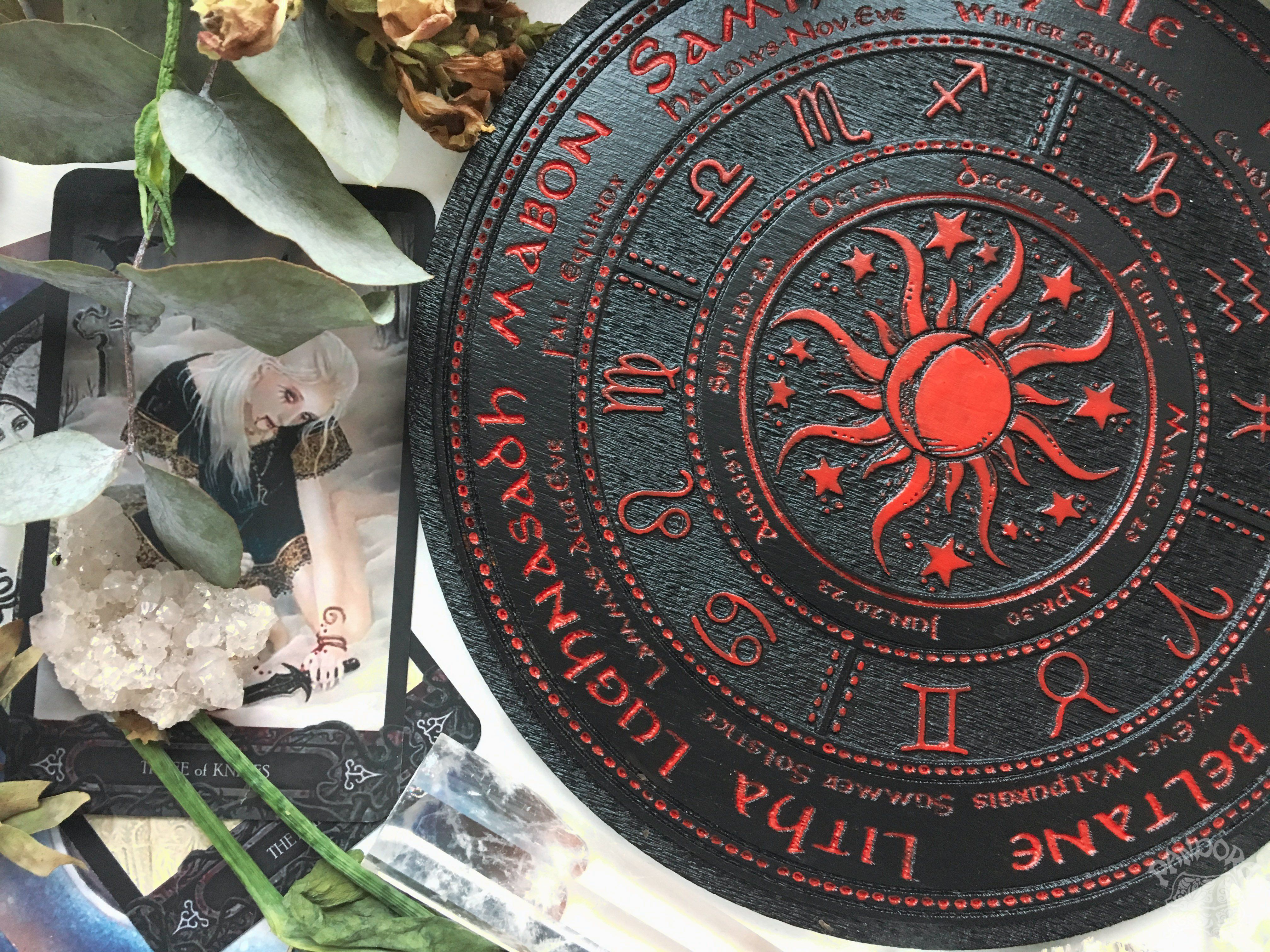 Wooden Wheel of the Year - calendar of pagan festivals and seasonal sabbaths: Yule, Imbolc, Ostara, Beltane, Litha, Lammas, Mabon, Samhain.