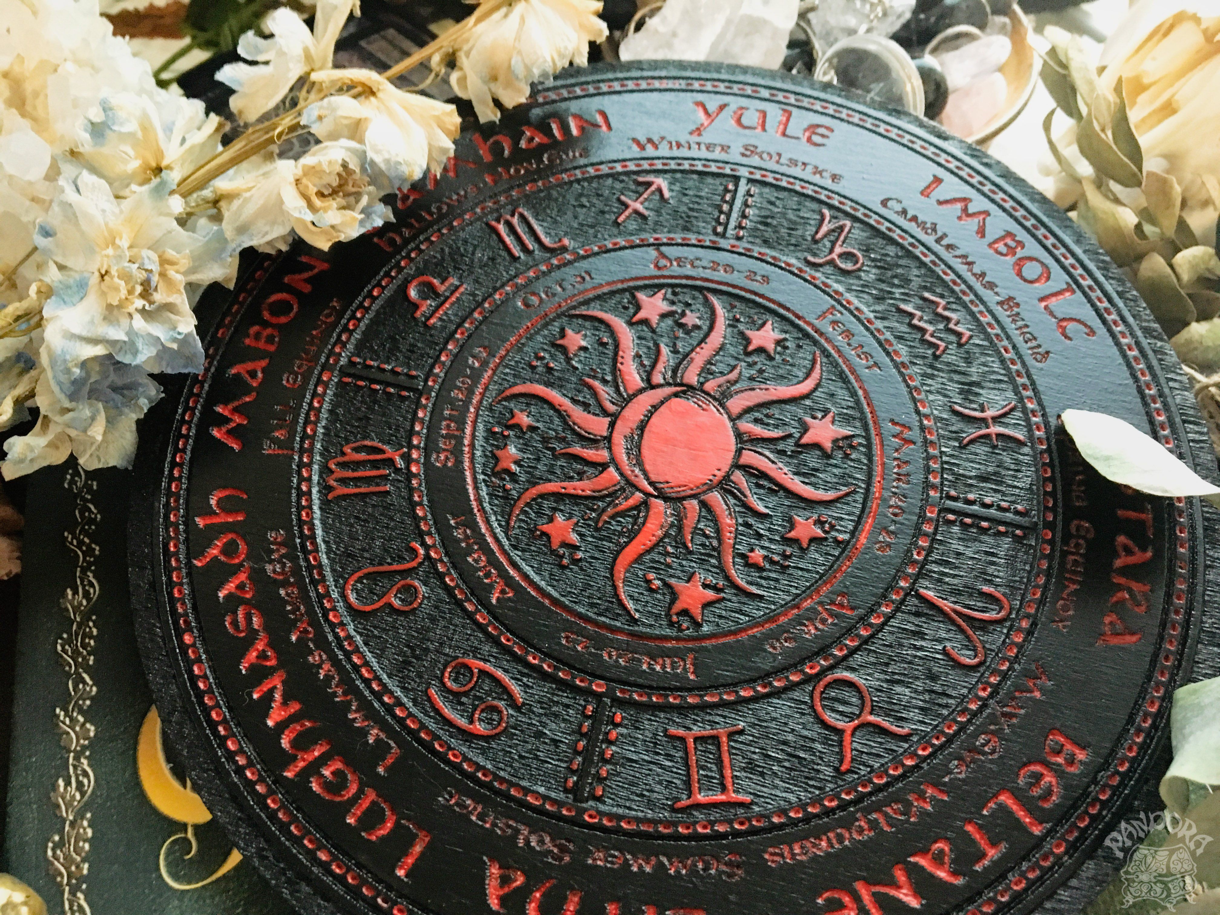 Wooden Wheel of the Year - calendar of pagan festivals and seasonal sabbaths: Yule, Imbolc, Ostara, Beltane, Litha, Lammas, Mabon, Samhain.