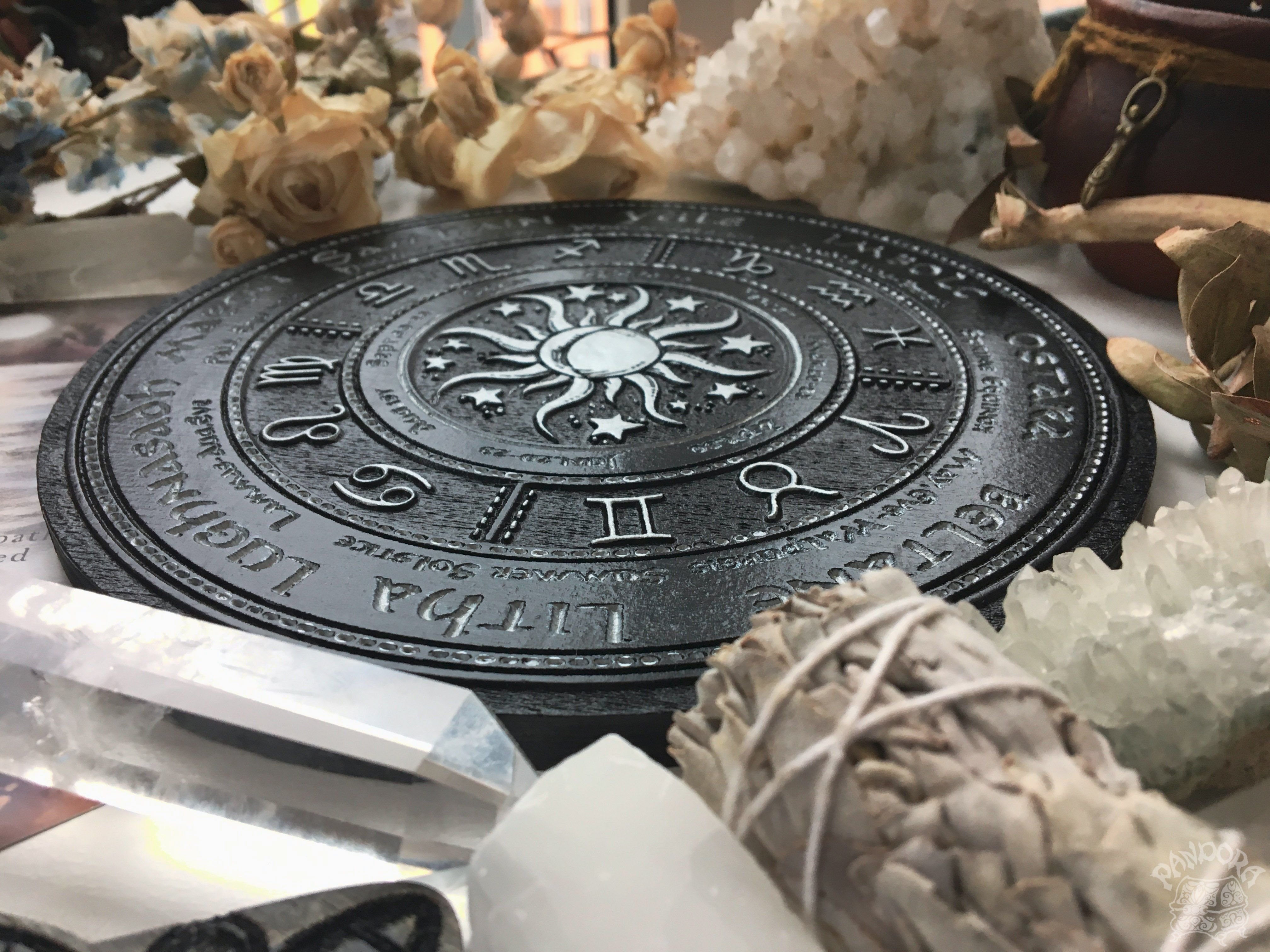Wooden Wheel of the Year - calendar of pagan festivals and seasonal sabbaths: Yule, Imbolc, Ostara, Beltane, Litha, Lammas, Mabon, Samhain.