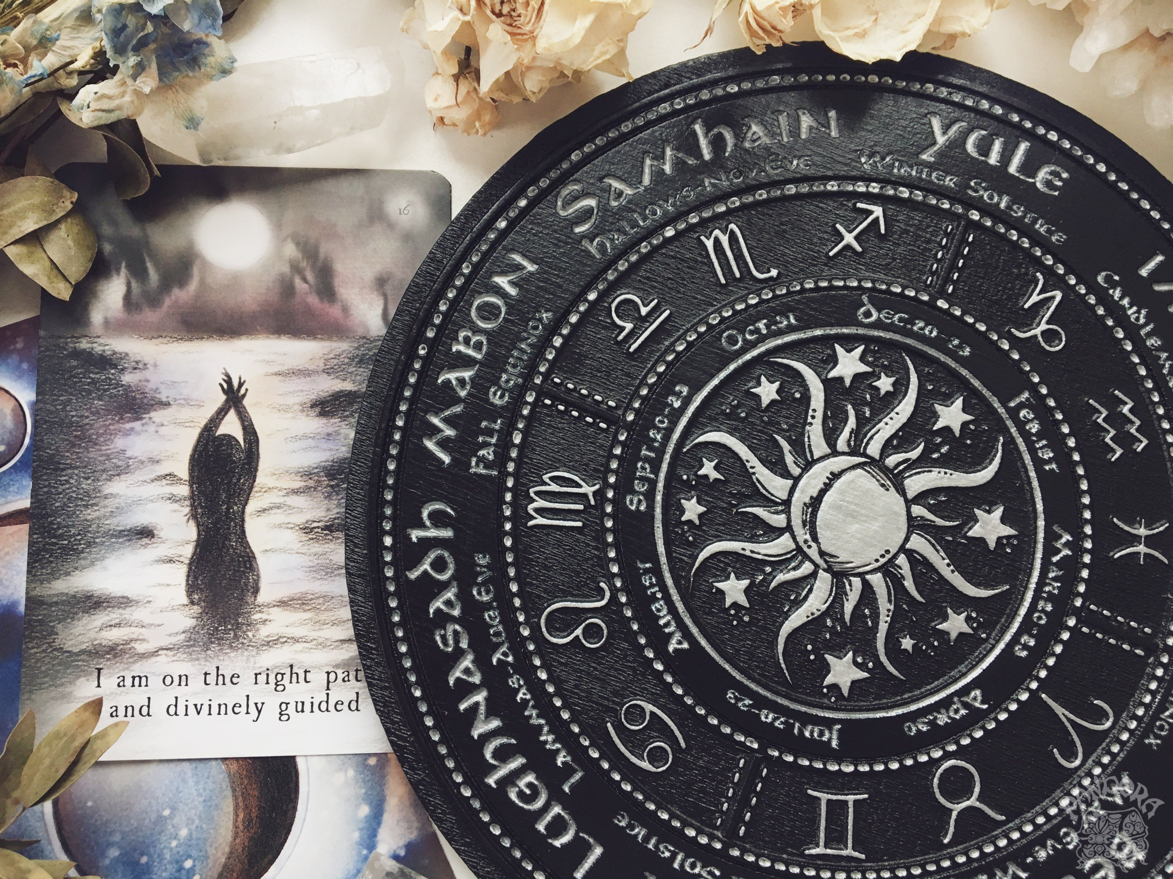 Wooden Wheel of the Year - calendar of pagan festivals and seasonal sabbaths: Yule, Imbolc, Ostara, Beltane, Litha, Lammas, Mabon, Samhain.