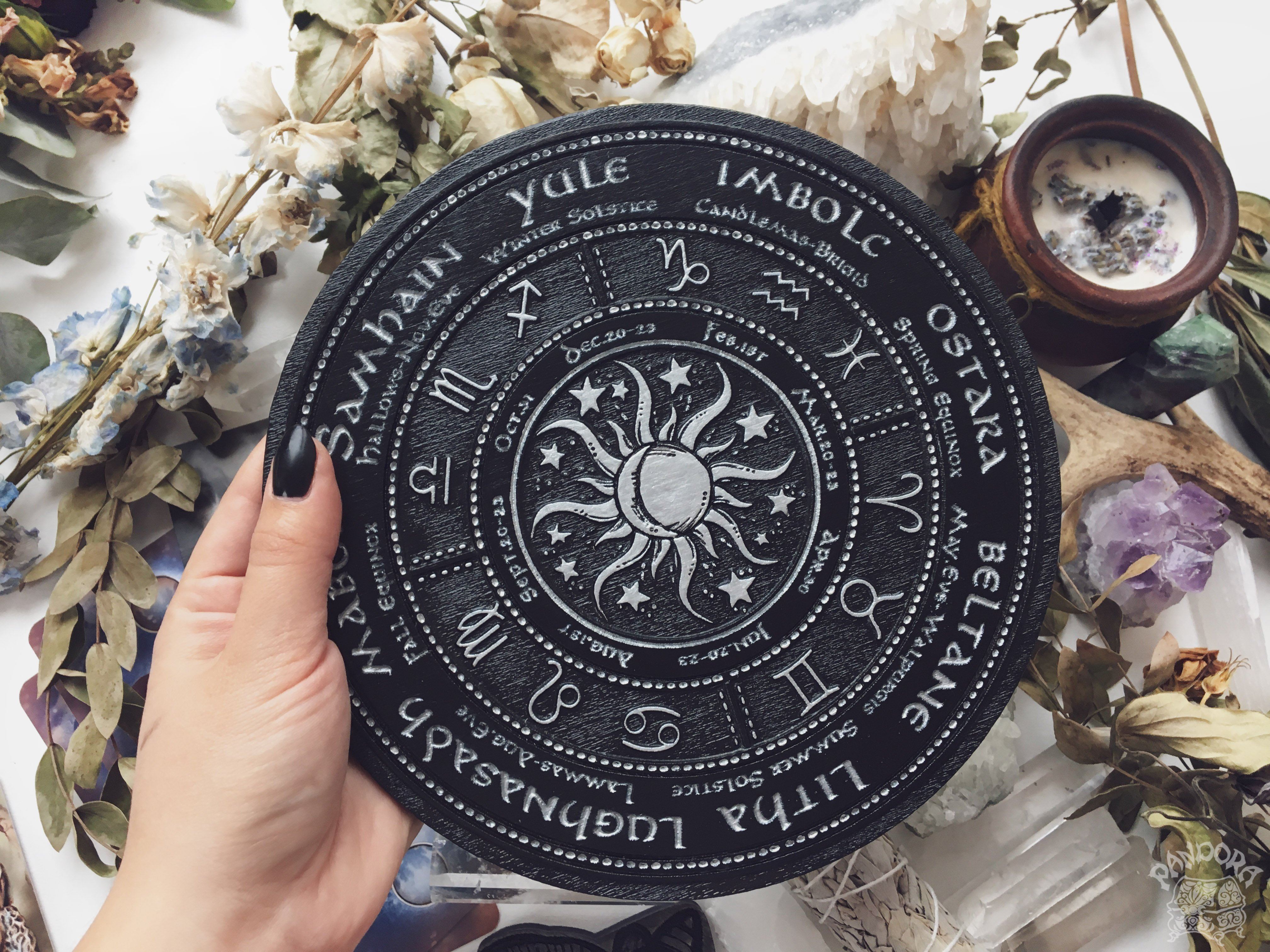 Wooden Wheel of the Year - calendar of pagan festivals and seasonal sabbaths: Yule, Imbolc, Ostara, Beltane, Litha, Lammas, Mabon, Samhain.