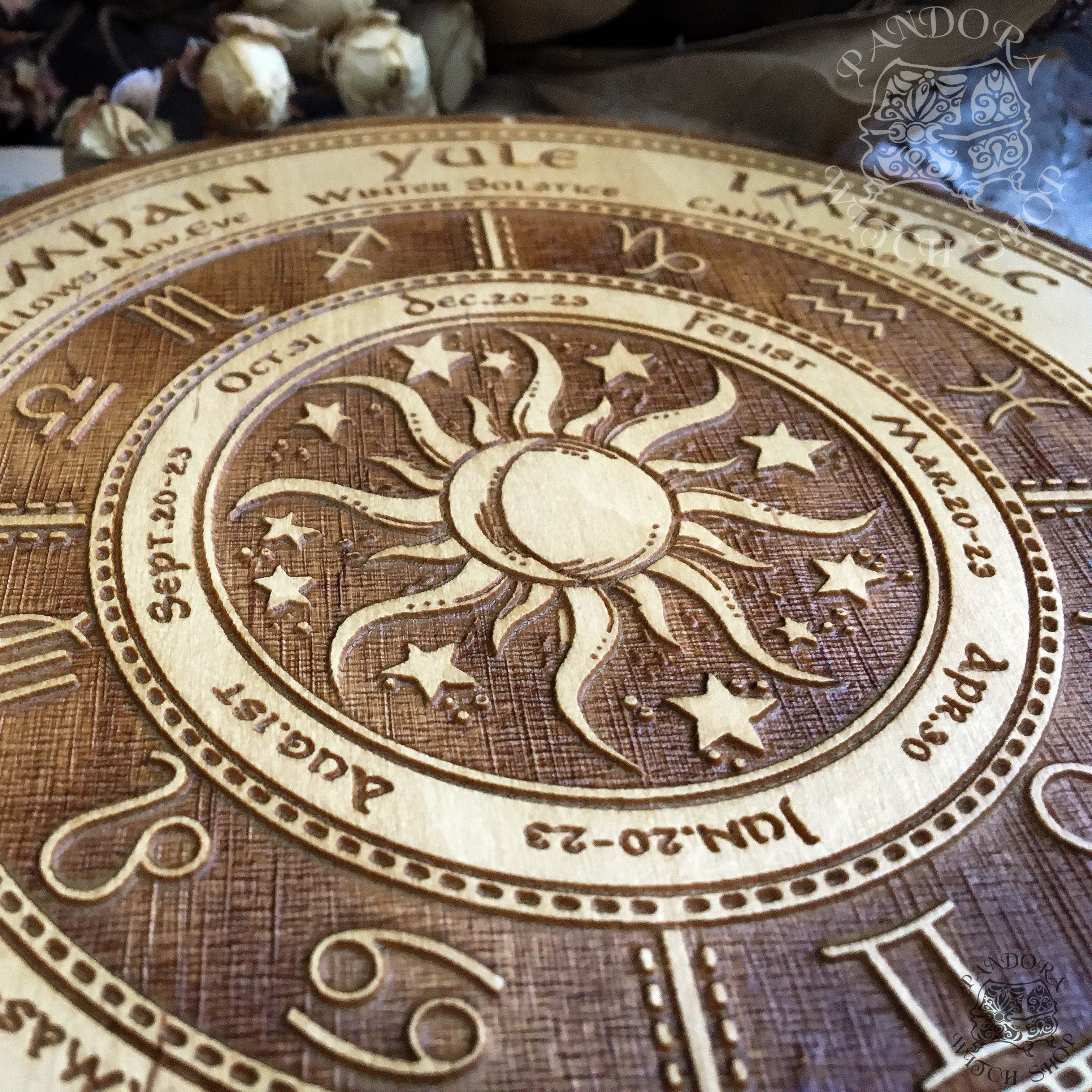 Wooden Wheel of the Year - calendar of pagan festivals and seasonal sabbaths: Yule, Imbolc, Ostara, Beltane, Litha, Lammas, Mabon, Samhain.
