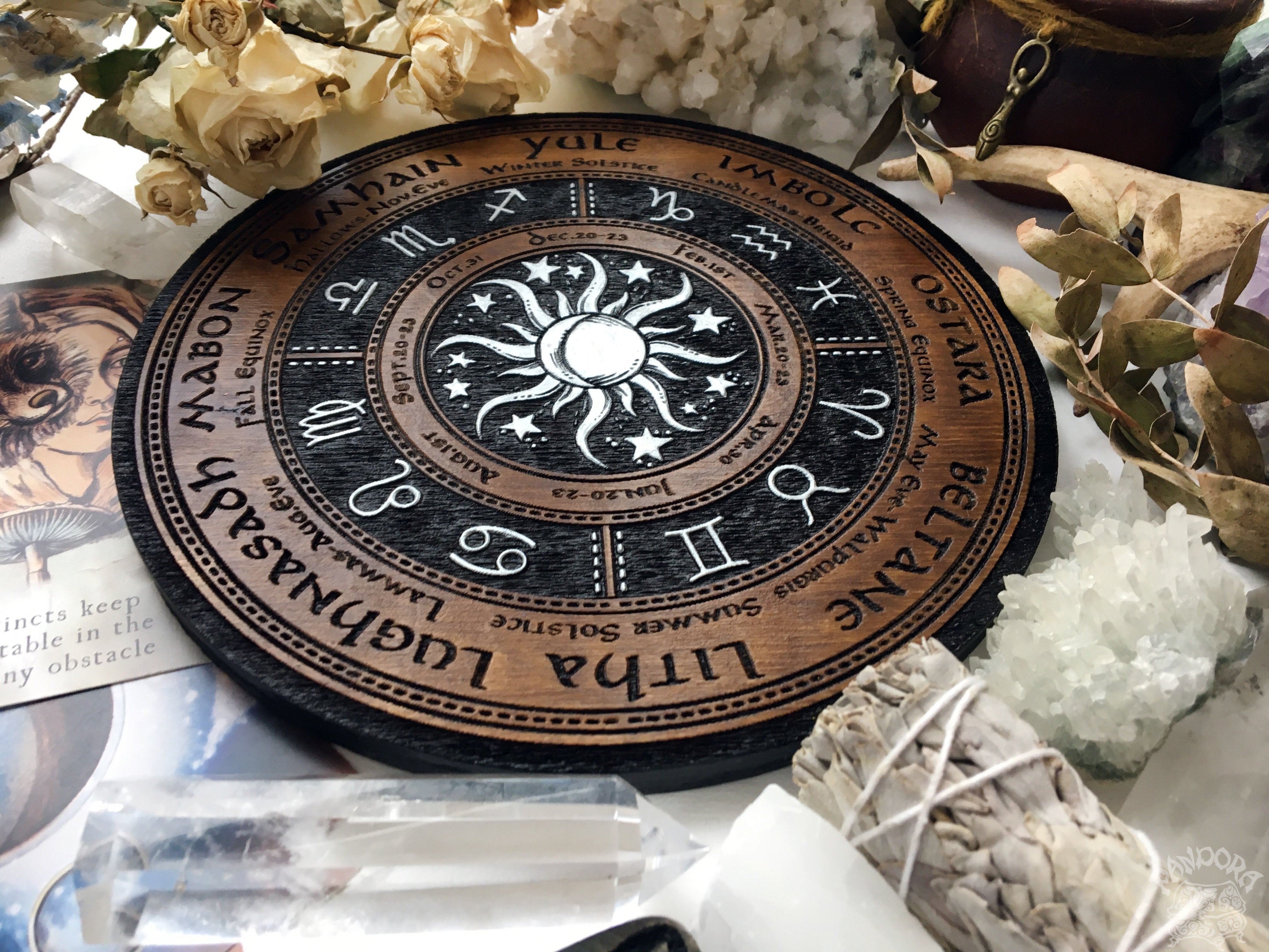 Wooden Wheel of the Year - calendar of pagan festivals and seasonal sabbaths: Yule, Imbolc, Ostara, Beltane, Litha, Lammas, Mabon, Samhain.