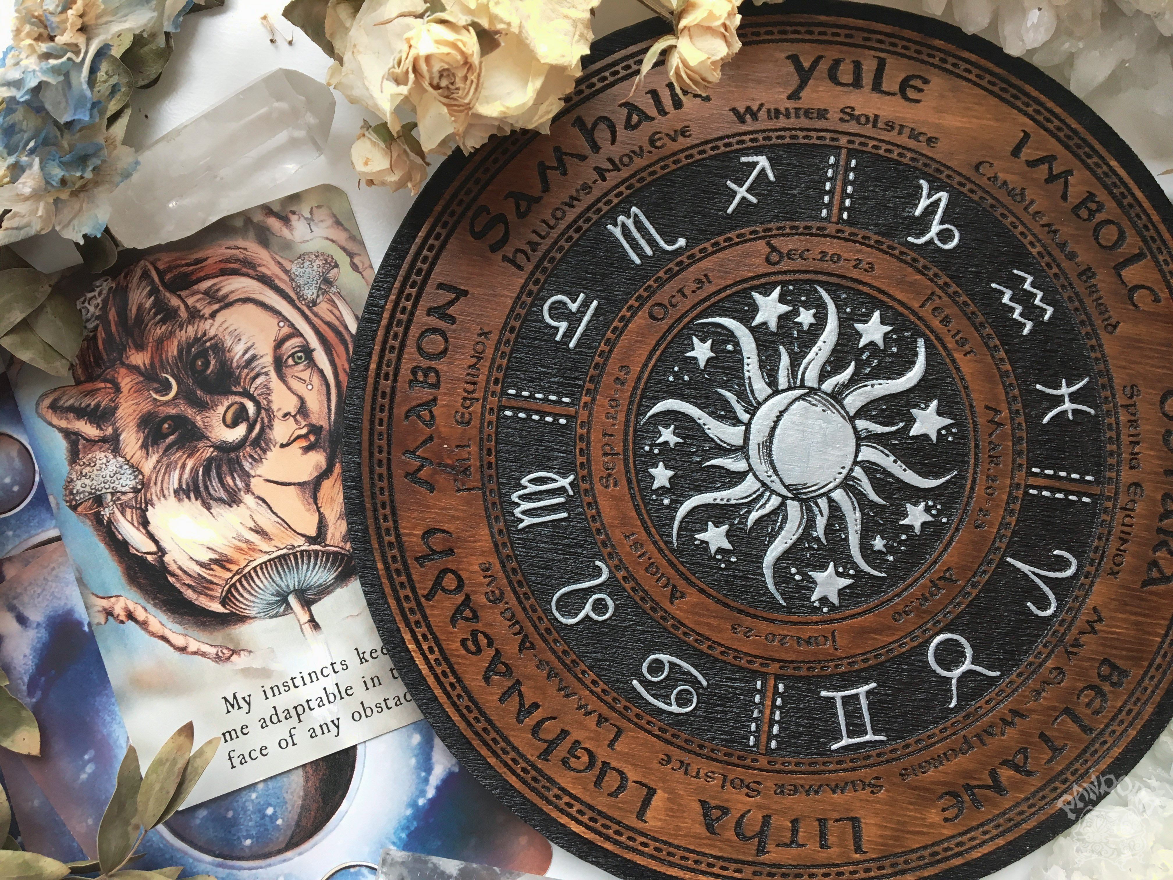 Wooden Wheel of the Year - calendar of pagan festivals and seasonal sabbaths: Yule, Imbolc, Ostara, Beltane, Litha, Lammas, Mabon, Samhain.