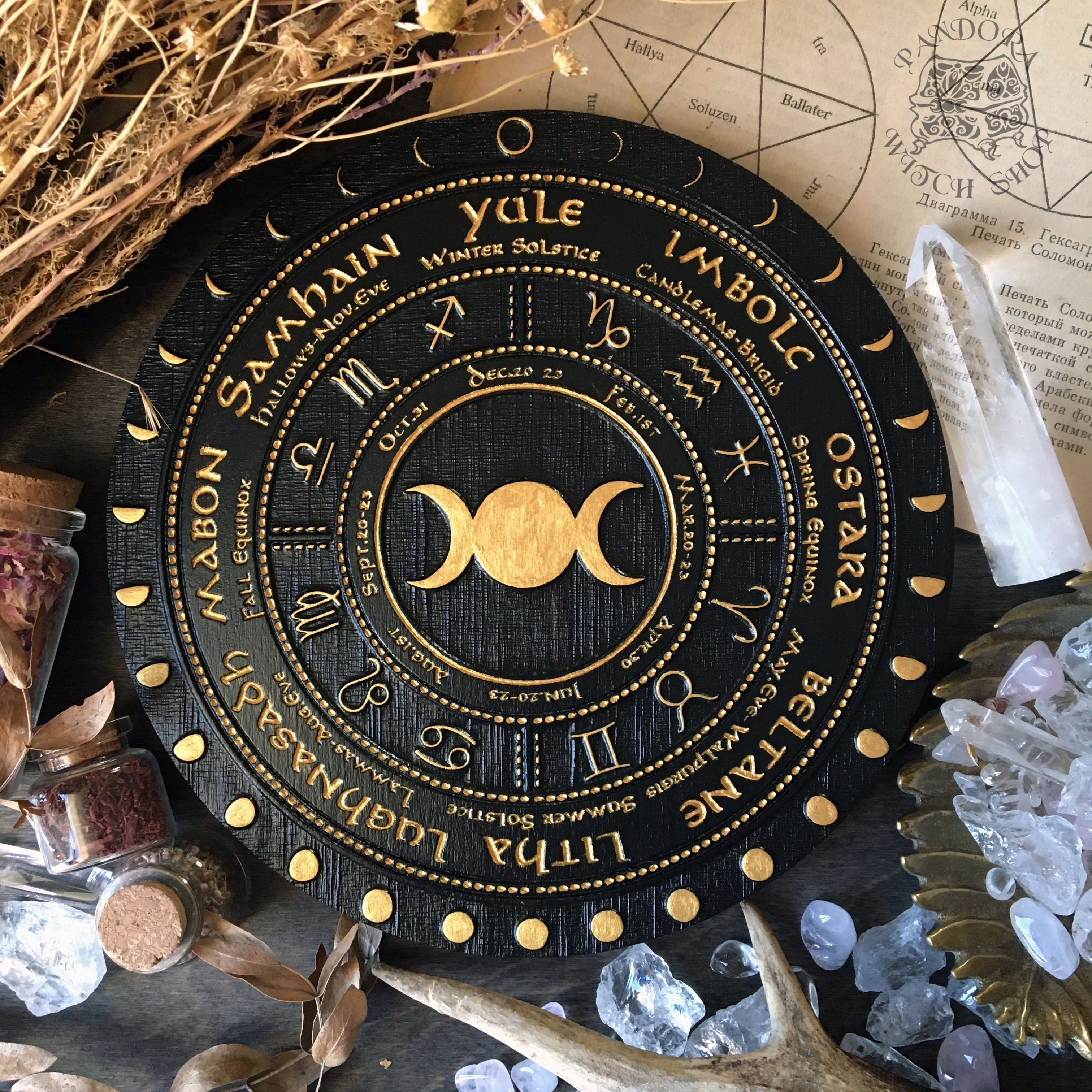 Wooden Wheel of the Year - calendar of pagan festivals and seasonal sabbaths: Yule, Imbolc, Ostara, Beltane, Litha, Lammas, Mabon, Samhain.